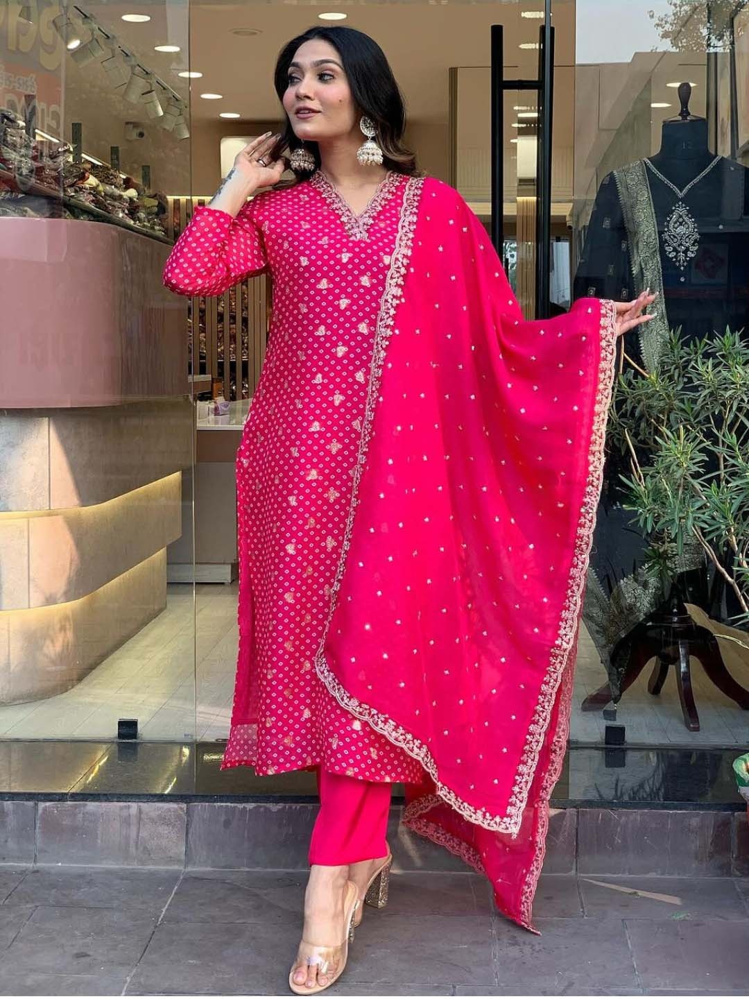 Navlik V-Neck Bandhani Printed Thread Work Straight Kurta with Trouser & Dupatta, Pink
Navlik V-Neck Bandhani Printed Thread Work Straight Kurta with Trouser & Dupatta, Pink