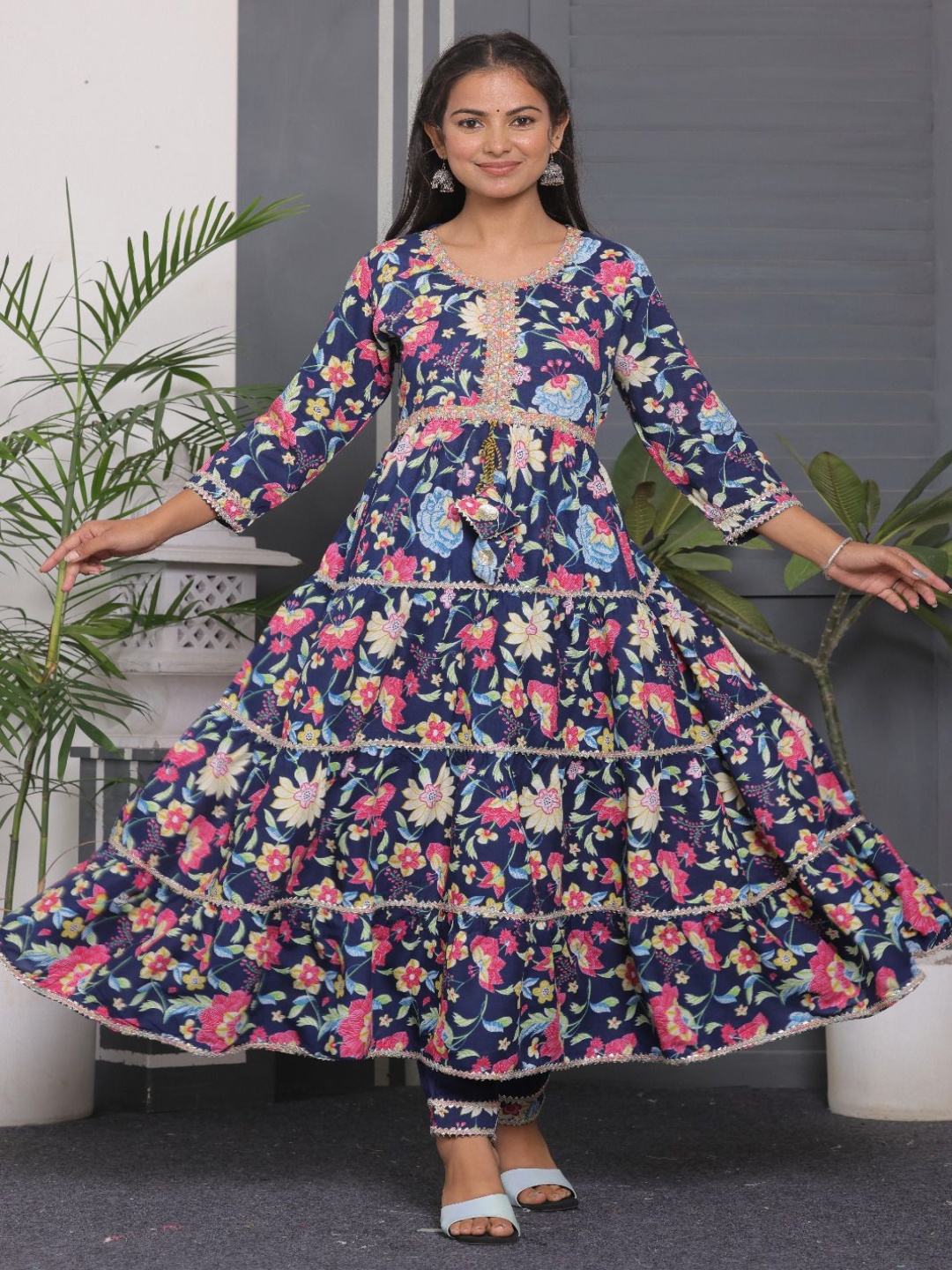 KALINI Floral Printed Tiered Gotta Patti Anarkali Kurta With Trousers And Dupatta, Navy blue
KALINI Floral Printed Tiered Gotta Patti Anarkali Kurta With Trousers And Dupatta, Navy blue