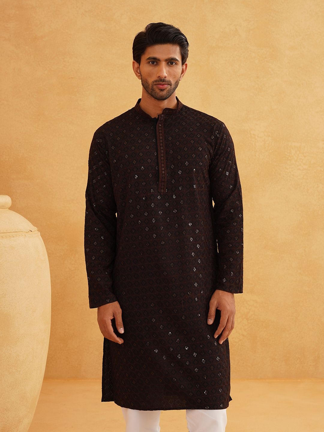 SOJANYA Ethnic Motifs Embroidered Mandarin Collar Sequinned Pure Cotton Straight Kurta, Coffee brown
SOJANYA Ethnic Motifs Embroidered Mandarin Collar Sequinned Pure Cotton Straight Kurta, Coffee brown