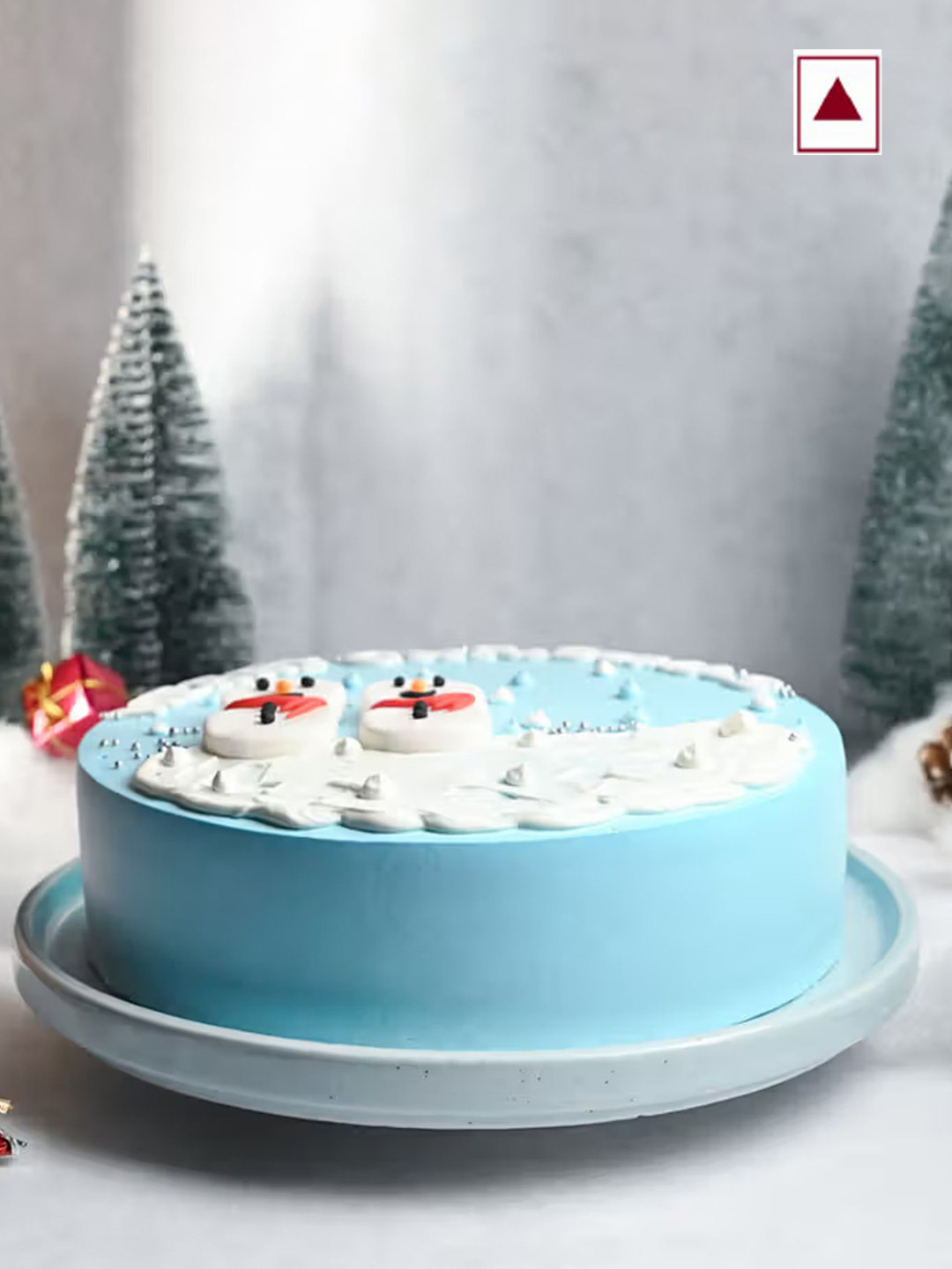 Floweraura Playful Snowman Christmas Pineapple Flavour Round Shape Cake- 3Kg, Blue
Floweraura Playful Snowman Christmas Pineapple Flavour Round Shape Cake- 3Kg, Blue