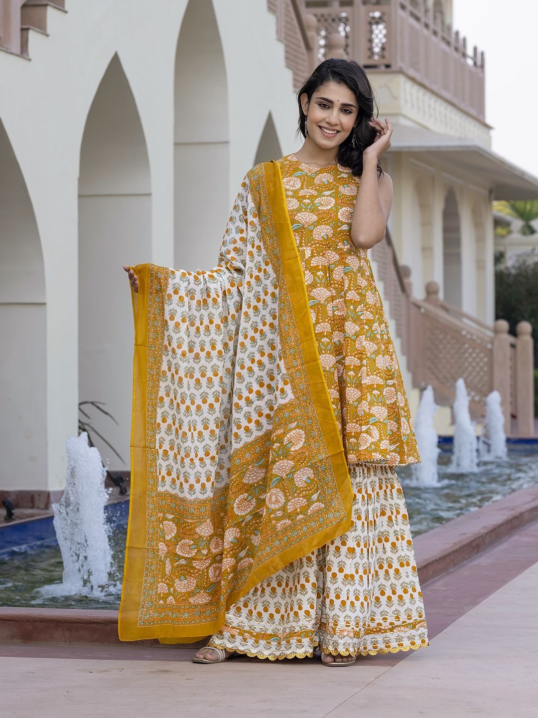 Jaitpuriya Floral Printed Panelled Pure Cotton Anarkali Kurta With Sharara & Dupatta, Mustard
Jaitpuriya Floral Printed Panelled Pure Cotton Anarkali Kurta With Sharara & Dupatta, Mustard