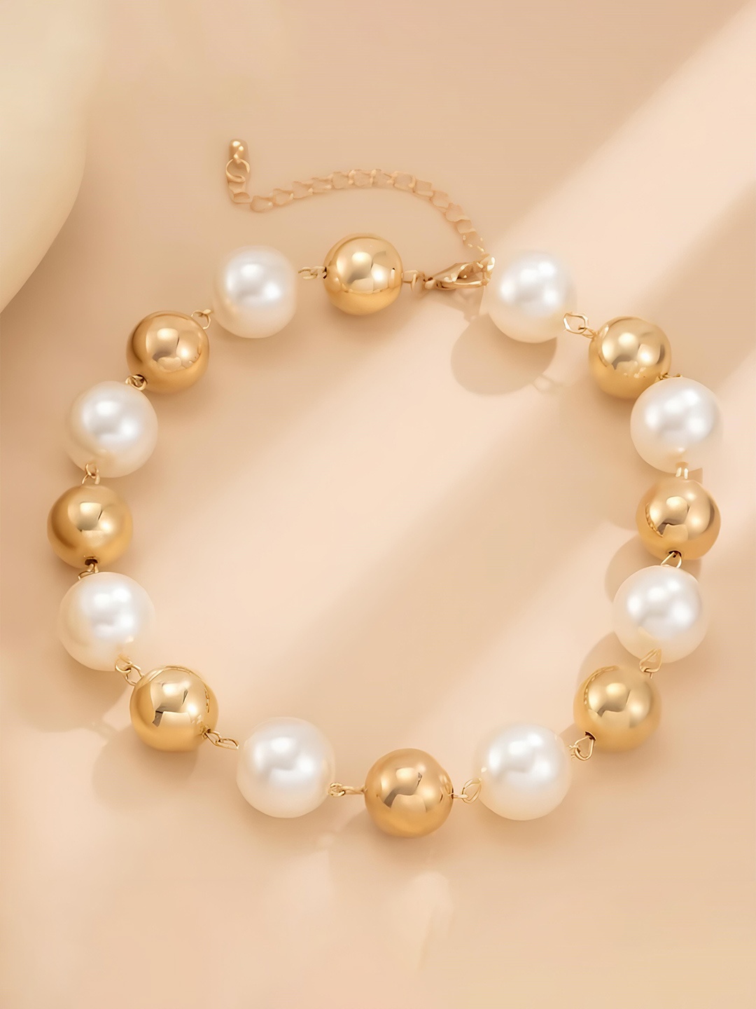 KARISHMA KREATIONS Gold-Plated Stainless Steel Anti Tarnish Round Pearls Beaded Necklace
KARISHMA KREATIONS Gold-Plated Stainless Steel Anti Tarnish Round Pearls Beaded Necklace