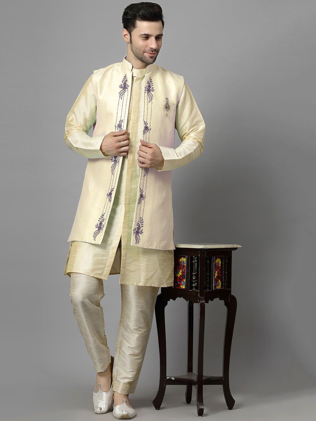 Utsav Fashion Men Ethnic Motifs Printed High Slit Beads and Stones Kurta with Trousers, Beige
Utsav Fashion Men Ethnic Motifs Printed High Slit Beads and Stones Kurta with Trousers, Beige