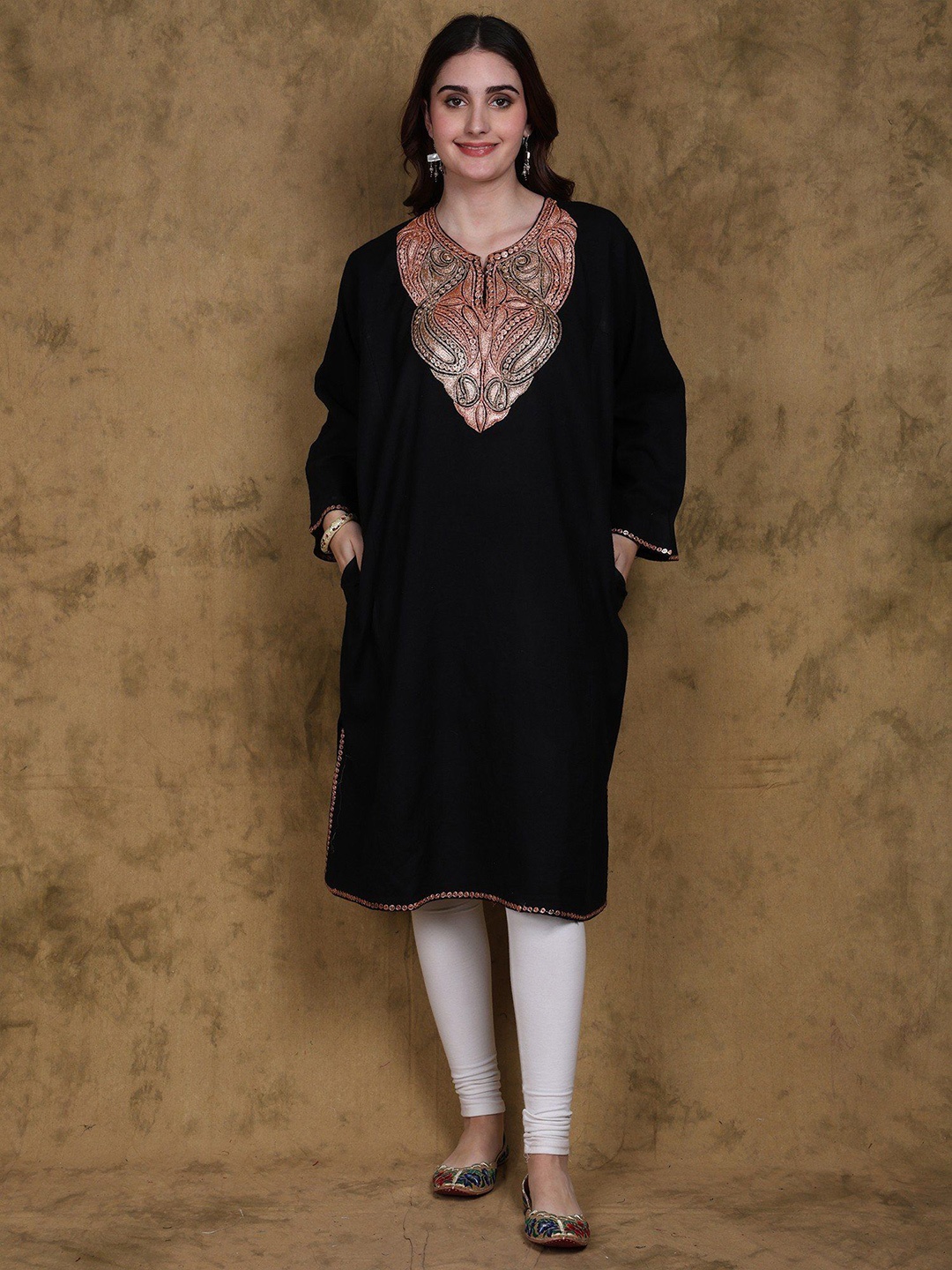 Exotic India Bristol Black Wool Kashmiri Phiran with Intricate Tilla Embroidery, Green
Exotic India Bristol Black Wool Kashmiri Phiran with Intricate Tilla Embroidery, Green