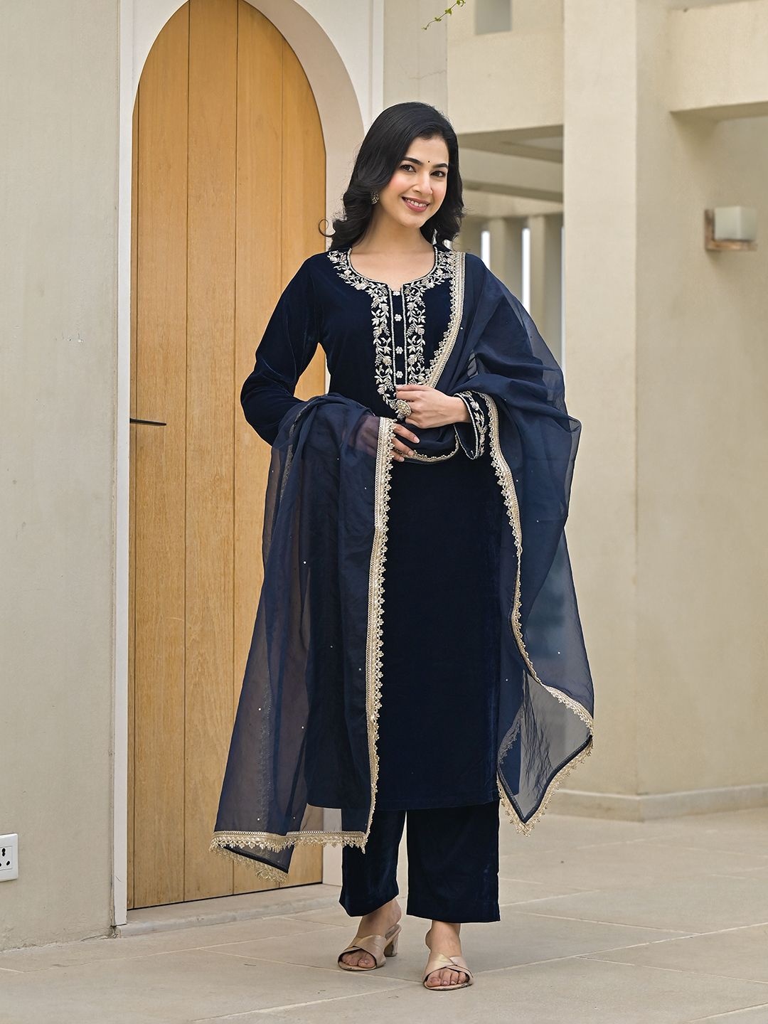 Divena Embroidered Notch Neck Velvet Straight Kurta With Trouser & Dupatta, Navy blue
Divena Embroidered Notch Neck Velvet Straight Kurta With Trouser & Dupatta, Navy blue