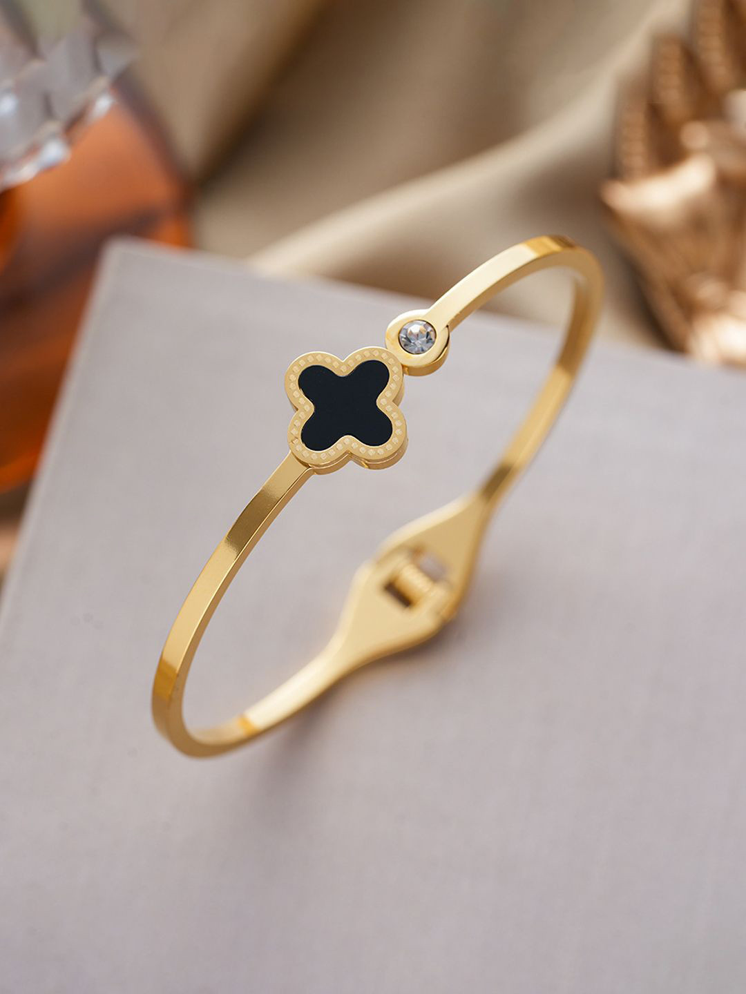 Designs & You Gold-Plated AD Studded Stainless Steel Anti Tarnish Bangle-Style Bracelet
Designs & You Gold-Plated AD Studded Stainless Steel Anti Tarnish Bangle-Style Bracelet