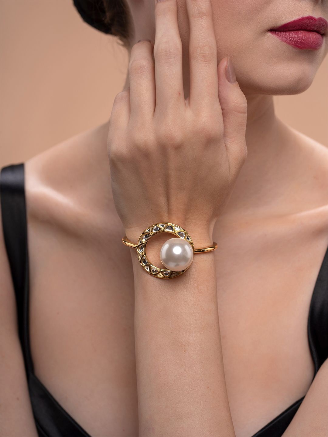 Isharya Gold-Plated Amara Circle Stone Studded & Pearls Beaded Adjustable Cuff Bracelet
Isharya Gold-Plated Amara Circle Stone Studded & Pearls Beaded Adjustable Cuff Bracelet