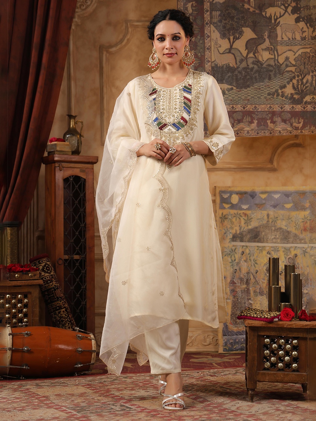 SCAKHI Women Floral Yoke Design Regular Sequinned Dupion Silk Kurta with Trousers & With Dupatta, Cream
SCAKHI Women Floral Yoke Design Regular Sequinned Dupion Silk Kurta with Trousers & With Dupatta, Cream