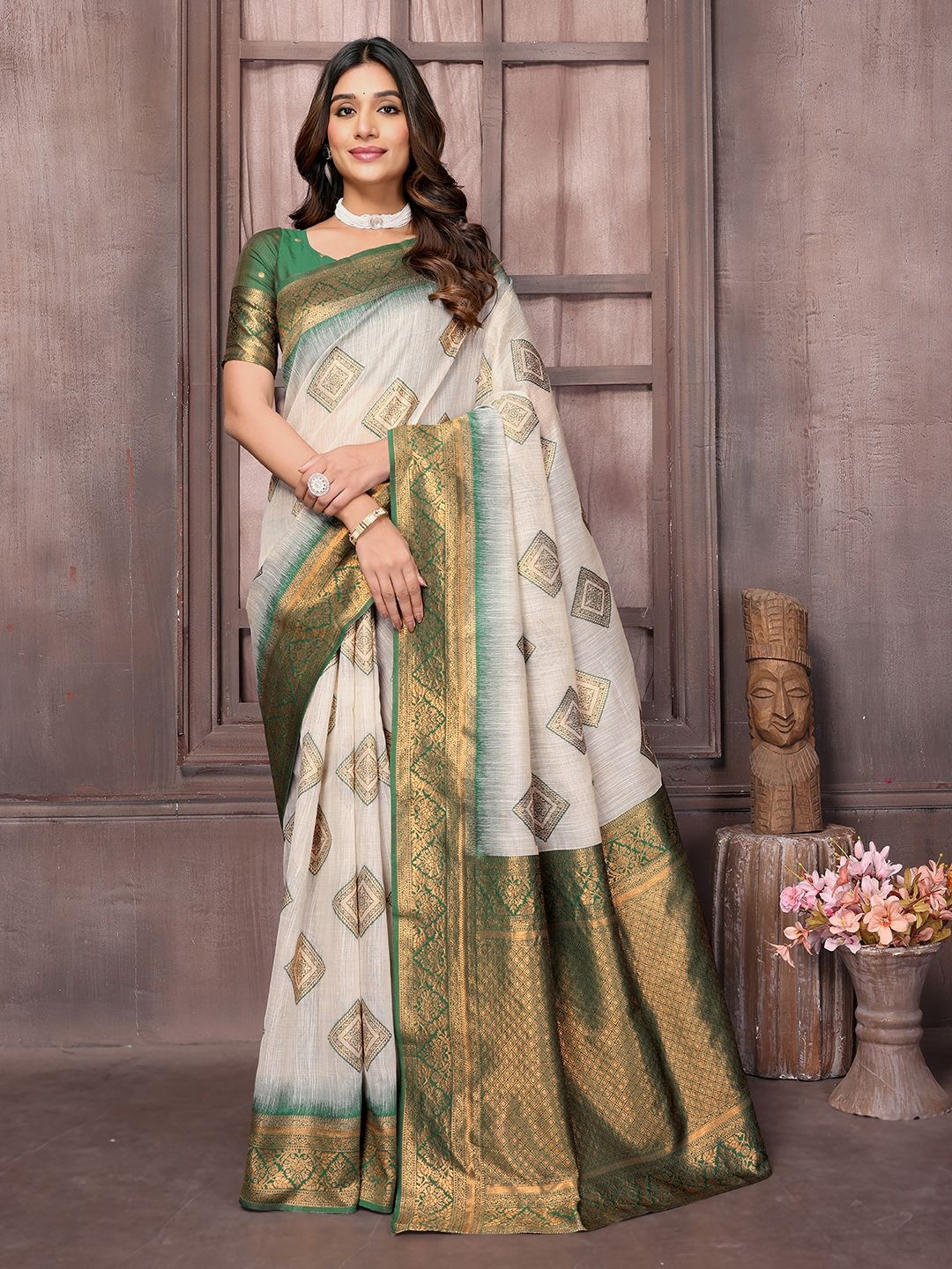 KALINI Women Beige & Green Linen Blend Ethnic Print Kanjivaram Saree with Blouse Piece
KALINI Women Beige & Green Linen Blend Ethnic Print Kanjivaram Saree with Blouse Piece