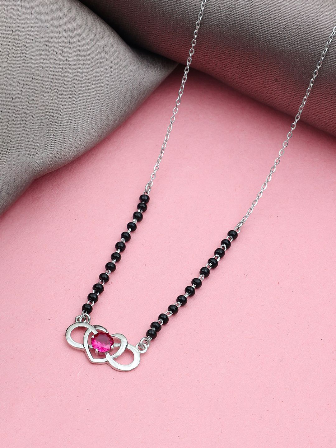 MAIRA 925 Sterling Silver-Plated Crystals Studded & Beaded Heart Shaped Mangalsutra
MAIRA 925 Sterling Silver-Plated Crystals Studded & Beaded Heart Shaped Mangalsutra