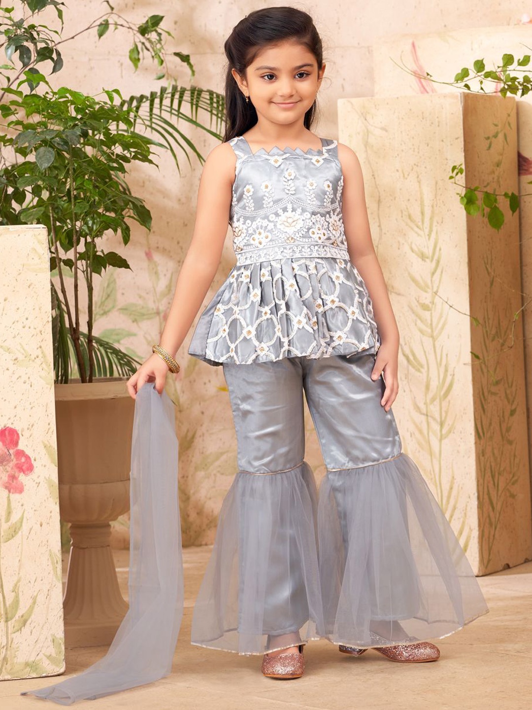 Sangria Girls Grey Floral Embroidered Shoulder Straps Neck Net Kurti & Sharara & Dupatta
Sangria Girls Grey Floral Embroidered Shoulder Straps Neck Net Kurti & Sharara & Dupatta