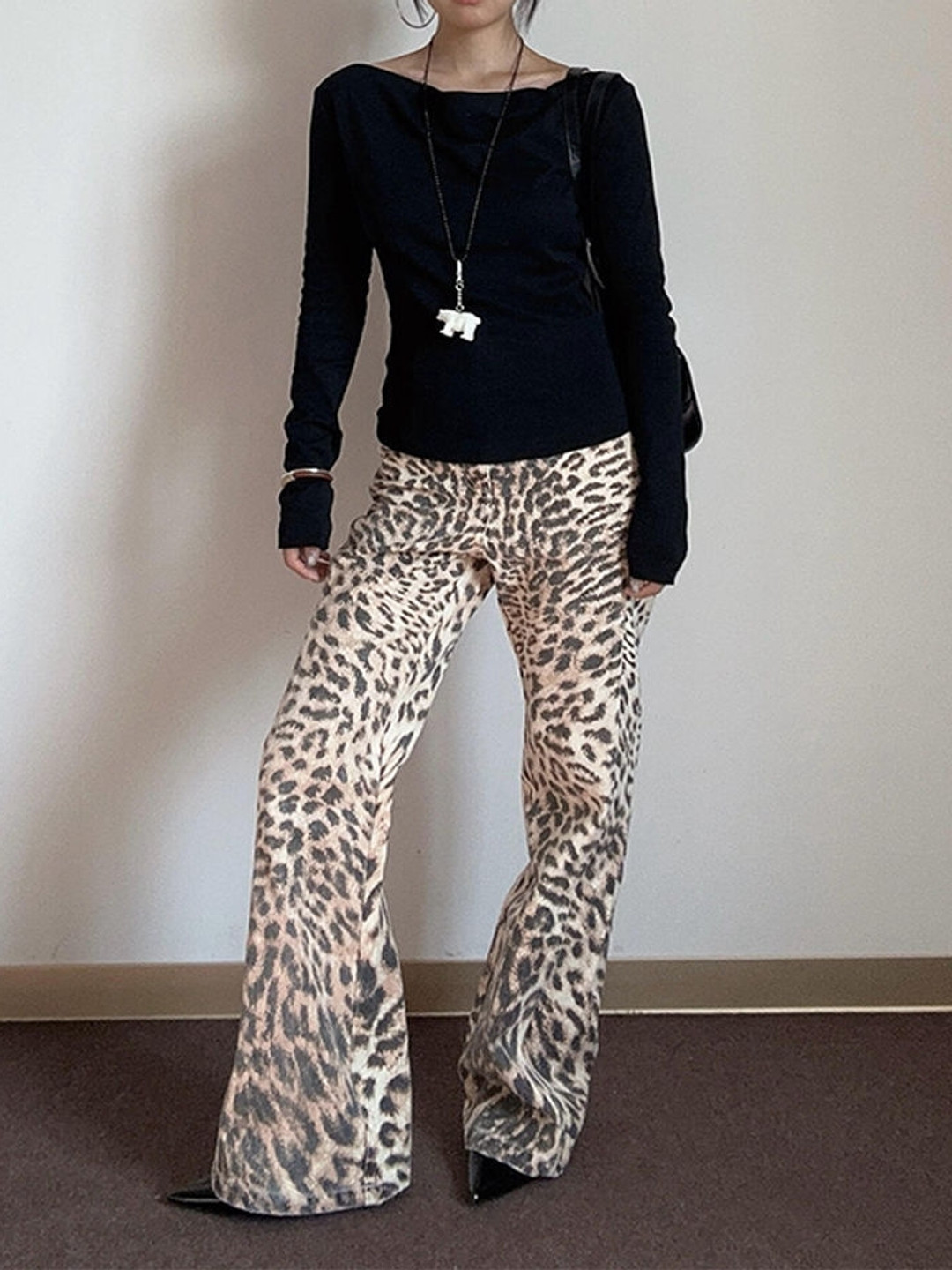 LULU & SKY Women Animal Printed Bootcut Trouser, White 
LULU & SKY Women Animal Printed Bootcut Trouser, White