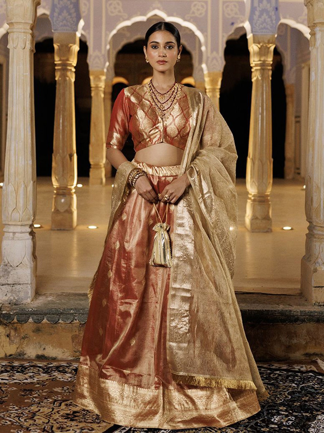 Geroo Luxe Woven Design V-Neck Tissue Lehenga & Unstitched Blouse With Dupatta, Red
Geroo Luxe Woven Design V-Neck Tissue Lehenga & Unstitched Blouse With Dupatta, Red