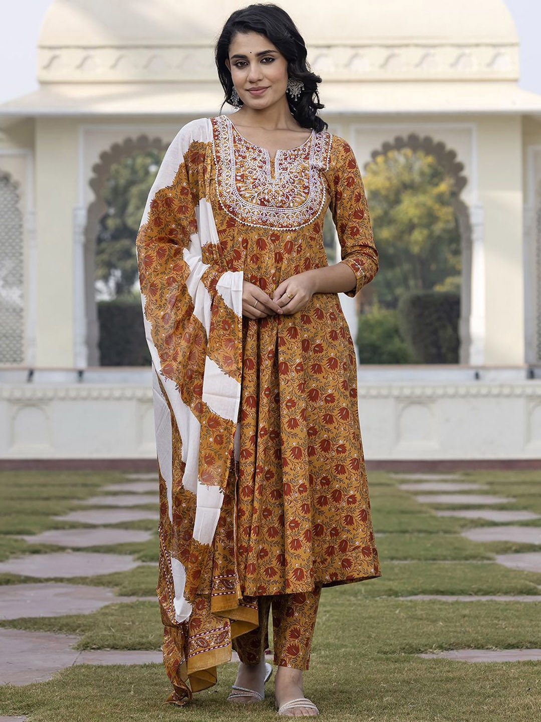 KALINI Floral Printed Thread Work Pure Cotton Anarkali Kurta With Trouser & Dupatta, Mustard
KALINI Floral Printed Thread Work Pure Cotton Anarkali Kurta With Trouser & Dupatta, Mustard