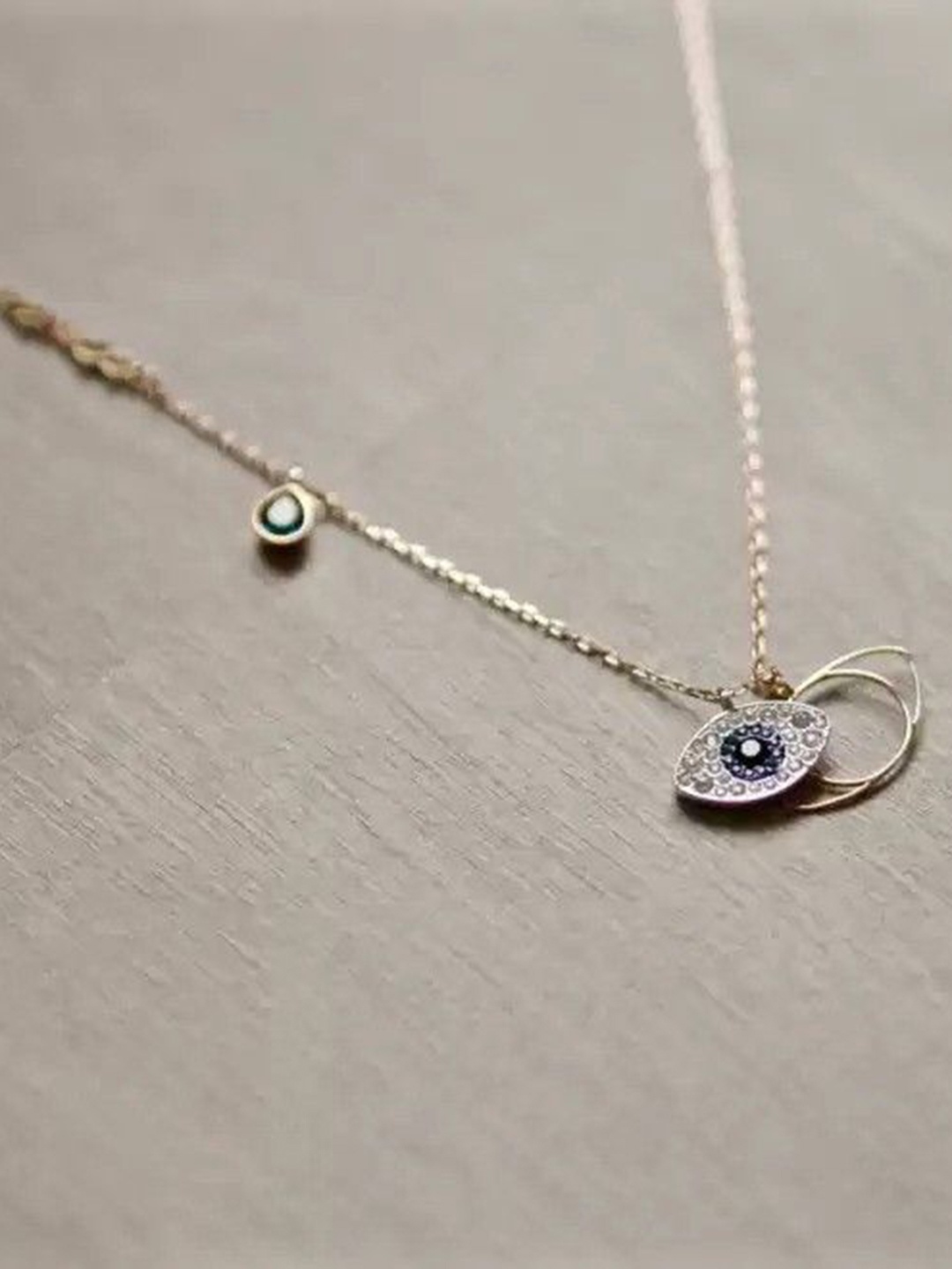 Wynona Rose Gold-Plated Stainless Steel Stone Studded Evil Eye Shaped Pendant & Chain
Wynona Rose Gold-Plated Stainless Steel Stone Studded Evil Eye Shaped Pendant & Chain