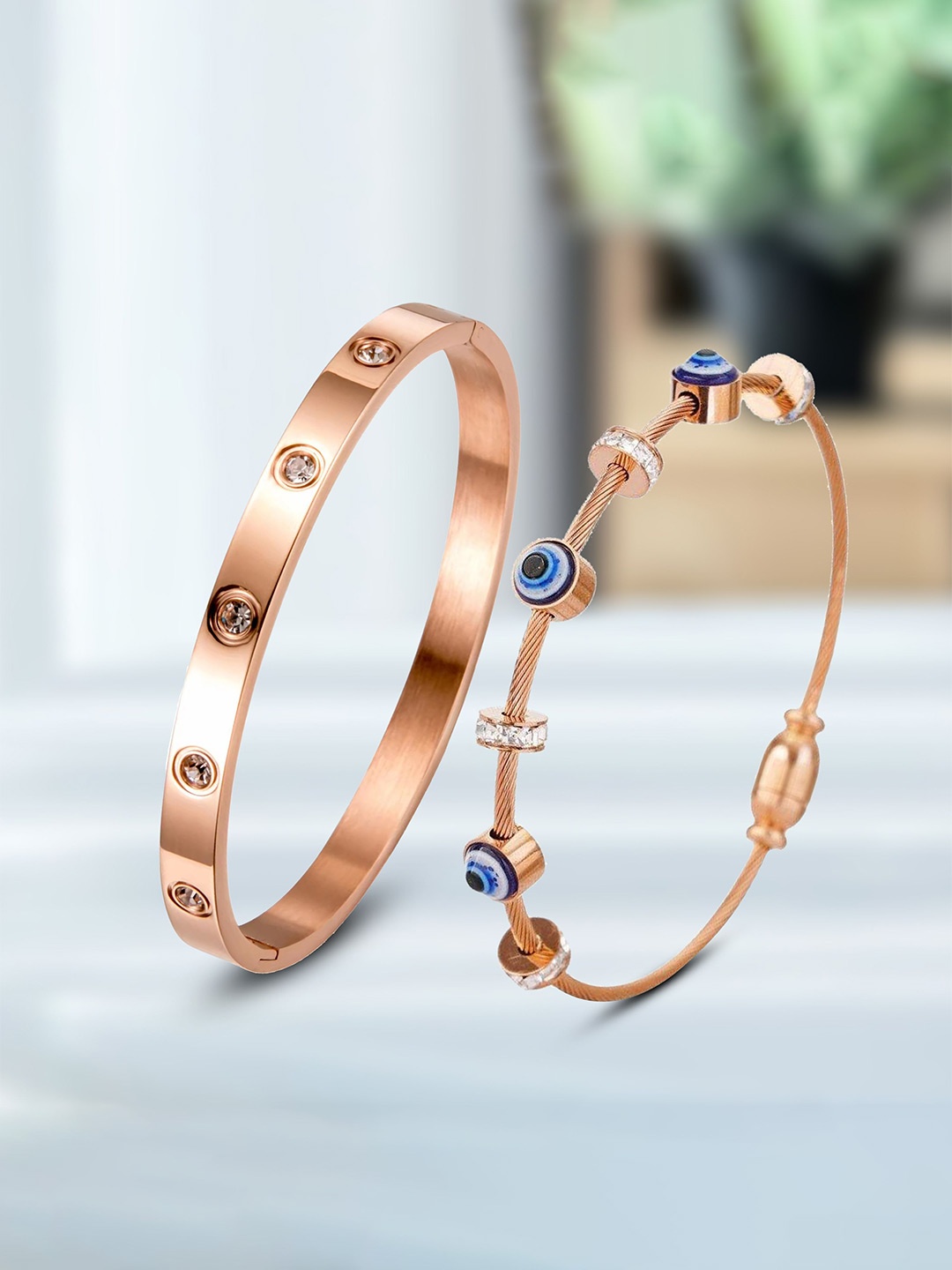 MEENAZ Set Of 2 Gold-Plated Stainless Steel American Diamond Anti Tarnis Kada Bracelets
MEENAZ Set Of 2 Gold-Plated Stainless Steel American Diamond Anti Tarnis Kada Bracelets