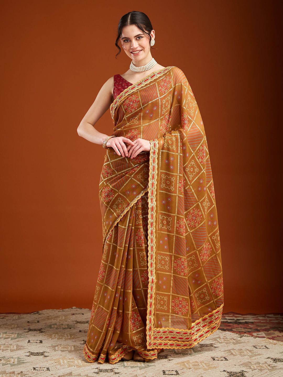 MAHALASA Bandhani Embroidered Pure Georgette Designer Bandhani Saree, Mustard
MAHALASA Bandhani Embroidered Pure Georgette Designer Bandhani Saree, Mustard