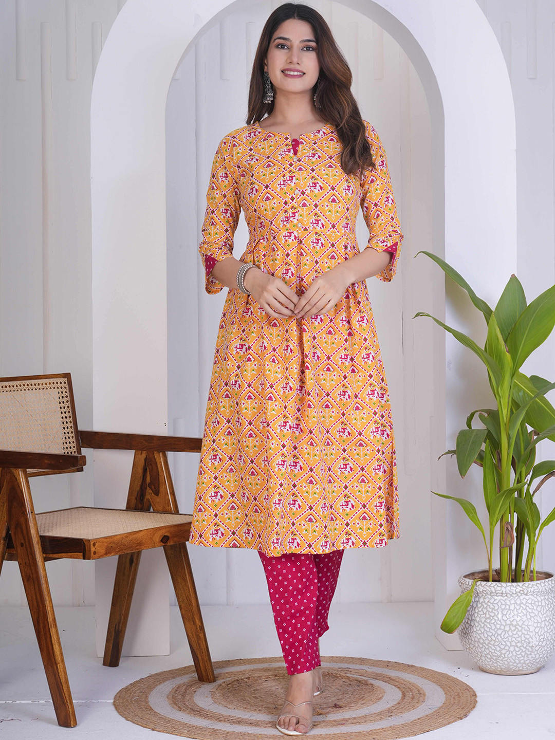 KALINI Round Neck Ikat Geometric Printed Anarkali Kurta with Trousers, Yellow
KALINI Round Neck Ikat Geometric Printed Anarkali Kurta with Trousers, Yellow