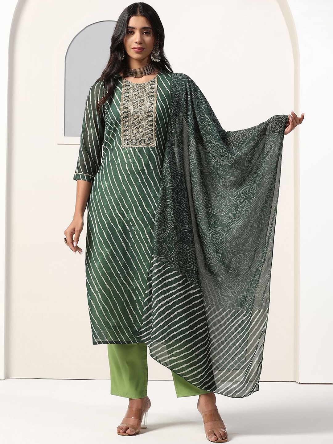 FASHION DREAM Leheriya Printed Thread Work Georgette Kurta with Trousers & Dupatta, Green
FASHION DREAM Leheriya Printed Thread Work Georgette Kurta with Trousers & Dupatta, Green