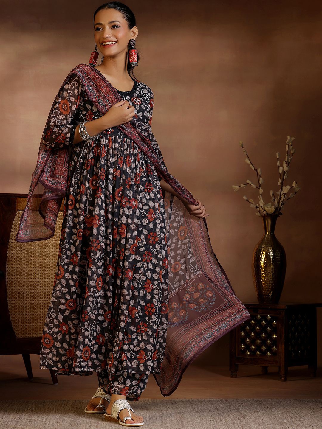 Libas Women Floral Printed Pleated Beads and Stones Anarkali Kurta With Palazzos & Dupatta, Black
Libas Women Floral Printed Pleated Beads and Stones Anarkali Kurta With Palazzos & Dupatta, Black