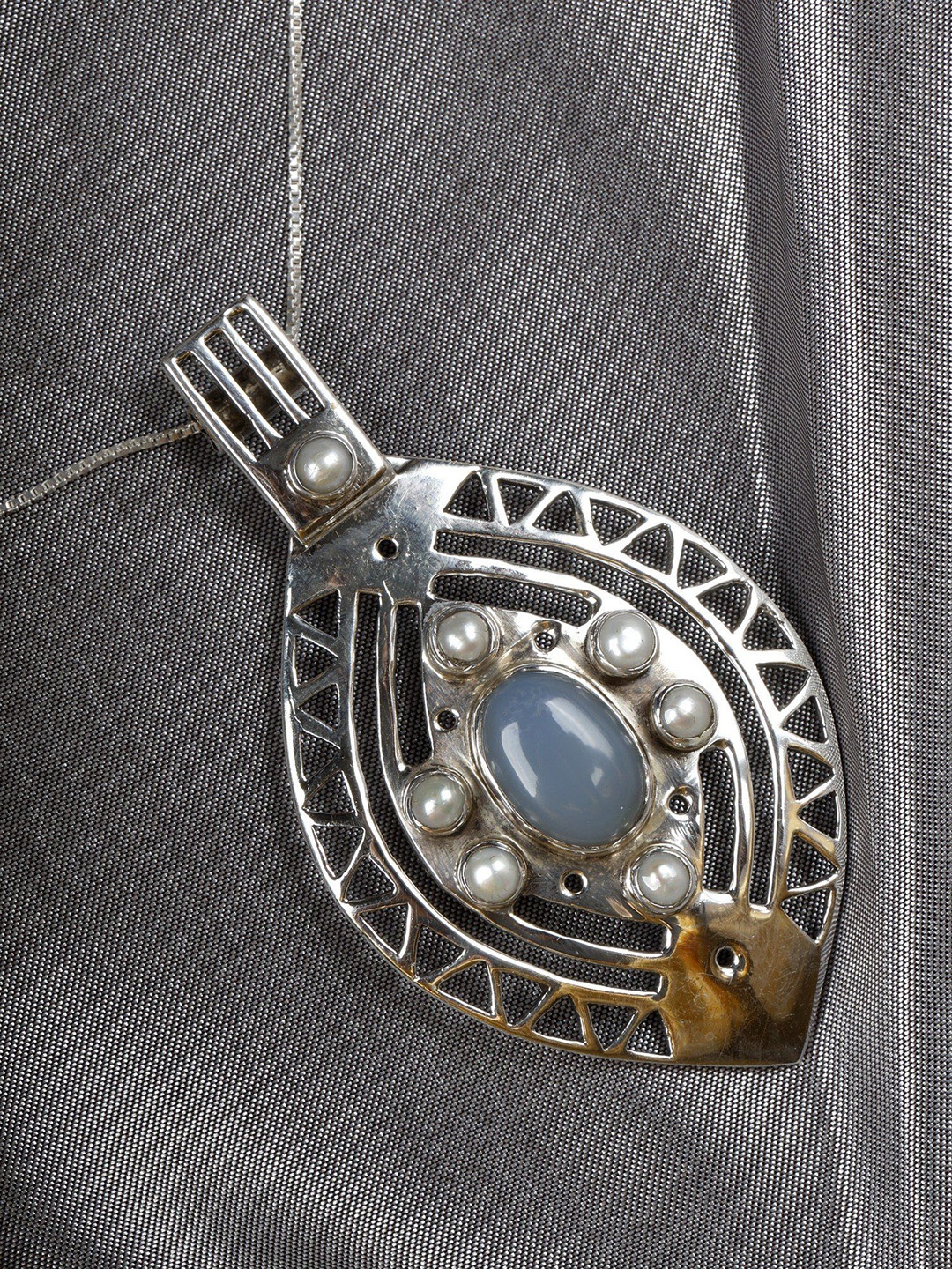 Exotic India Sterling Silver-Plated Chalcedony Oval Pendant With Chain
Exotic India Sterling Silver-Plated Chalcedony Oval Pendant With Chain