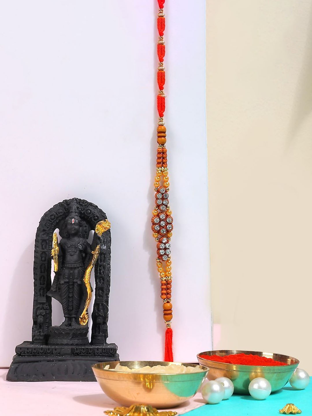 Phirki Studio Set of 2 Stone Studded Rakhi With God Figure Table stand & Roli Chawal, Gold
Phirki Studio Set of 2 Stone Studded Rakhi With God Figure Table stand & Roli Chawal, Gold
