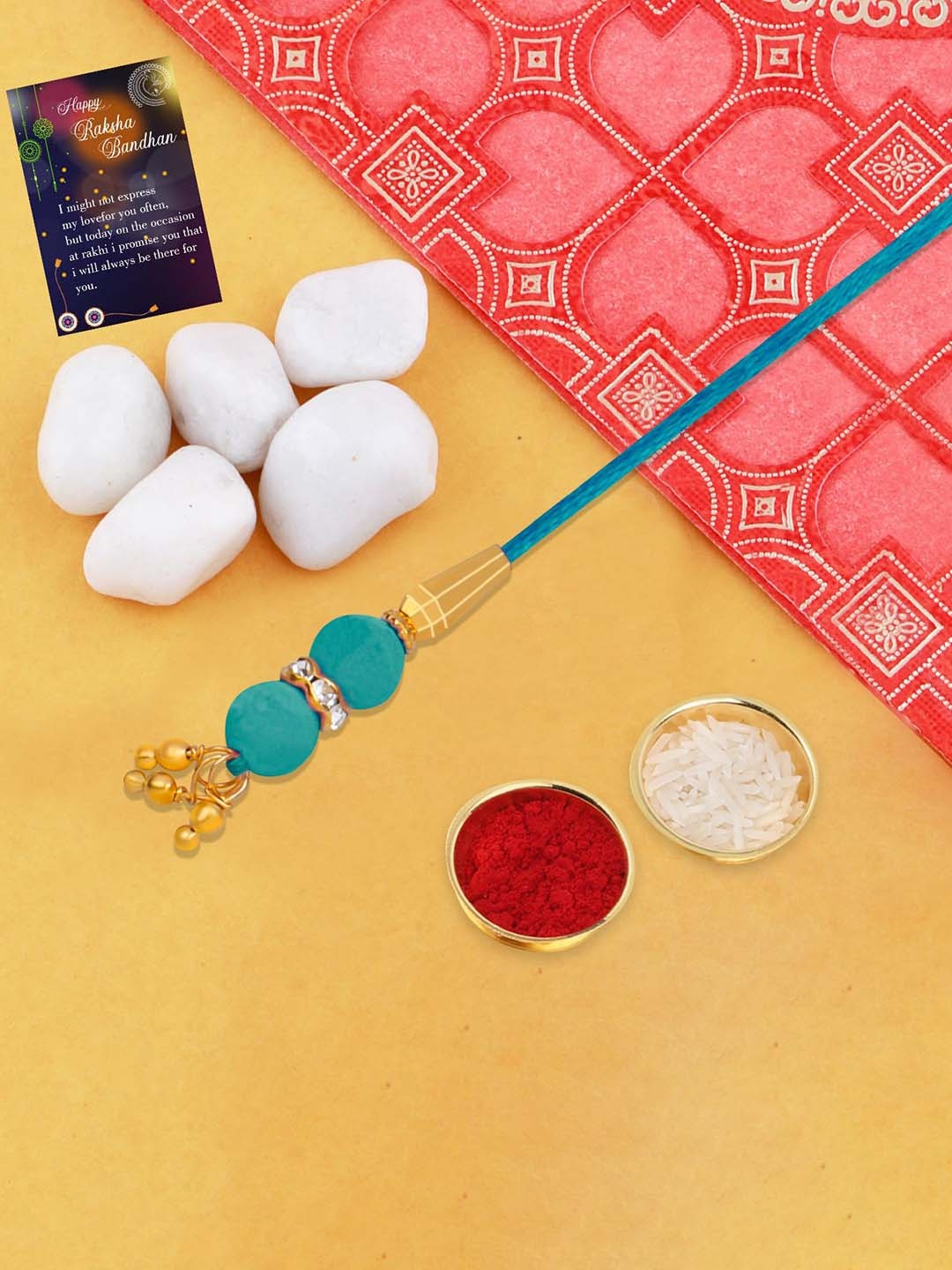 Silver Shine Stone Studded & Beaded Lumba Rakhi With Roli Chawal & Greeting Card, Blue
Silver Shine Stone Studded & Beaded Lumba Rakhi With Roli Chawal & Greeting Card, Blue