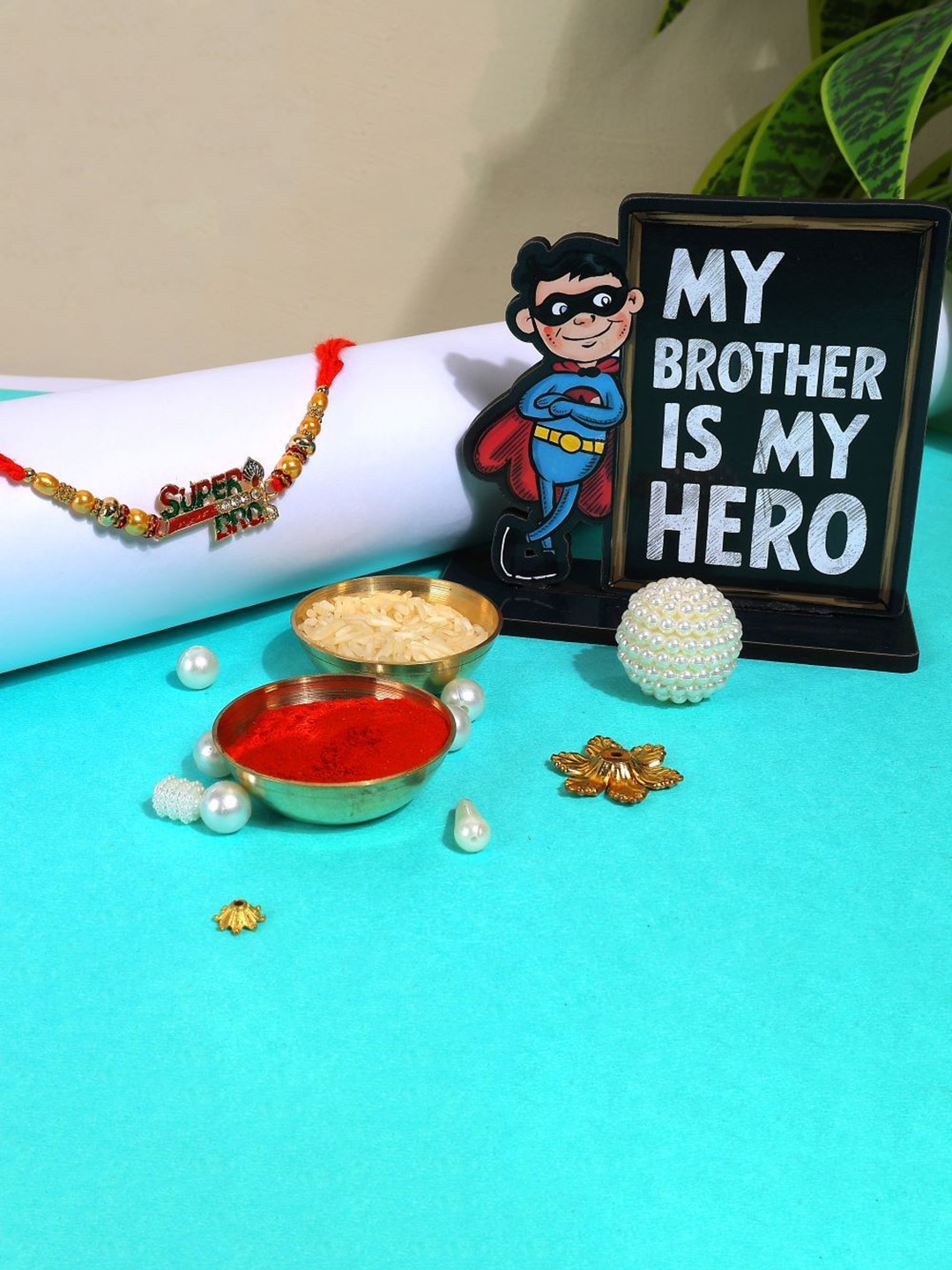 Phirki Studio Set of 2 Beaded Thread Rakhi With Brosis Table Stand & Roli Chawal, Red
Phirki Studio Set of 2 Beaded Thread Rakhi With Brosis Table Stand & Roli Chawal, Red