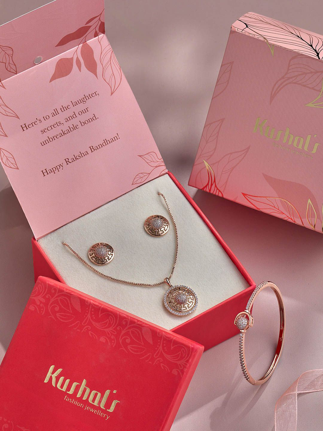 Kushal's Fashion Jewellery Rose Gold-Plated Cubic Zirconia Stones Studded Jewellery Set 
Kushal's Fashion Jewellery Rose Gold-Plated Cubic Zirconia Stones Studded Jewellery Set