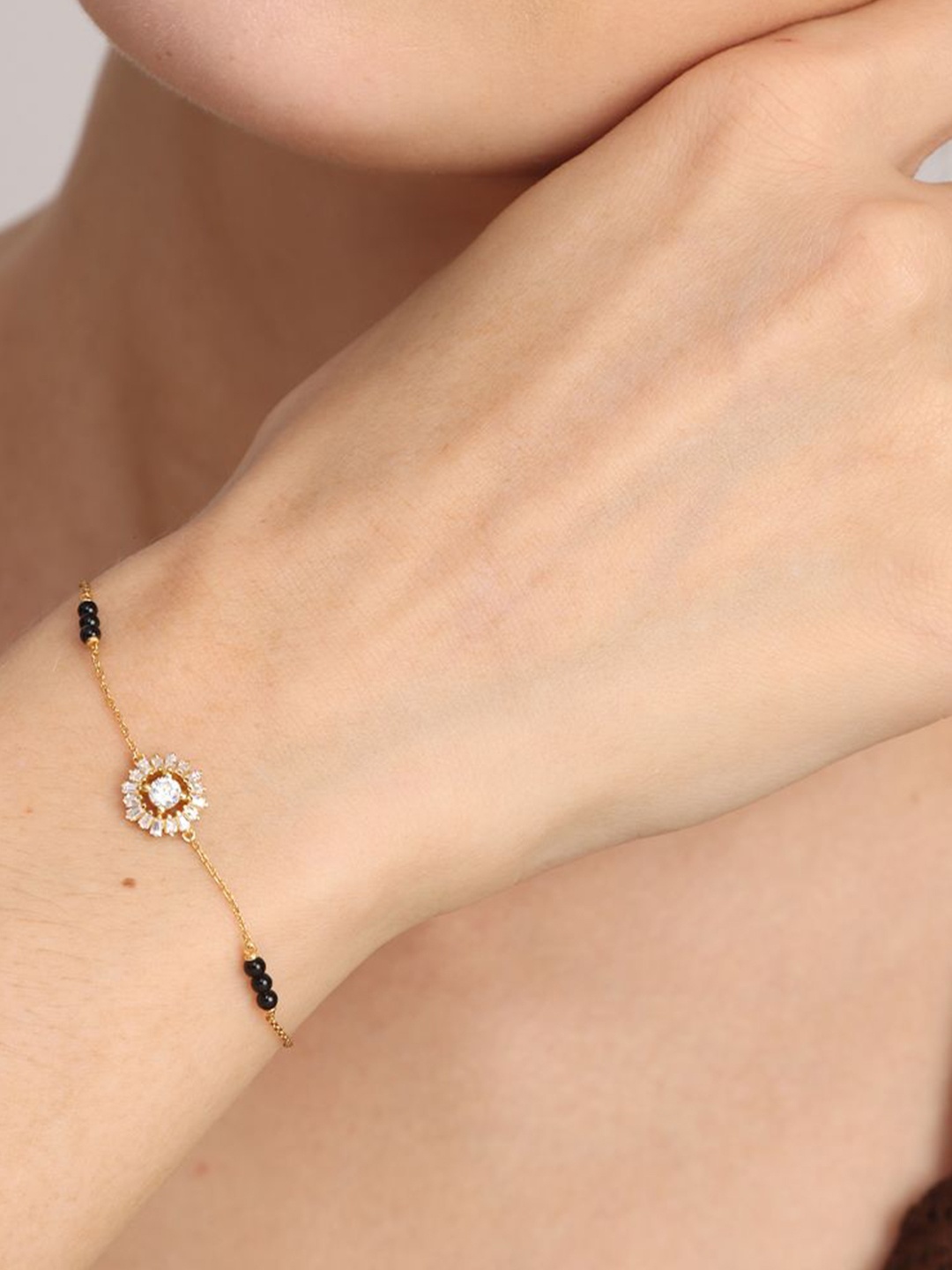 PALMONAS Hamsini 18K Gold-Plated Cubic Zirconia Studded Mangalsutra Wraparound Bracelet
PALMONAS Hamsini 18K Gold-Plated Cubic Zirconia Studded Mangalsutra Wraparound Bracelet
