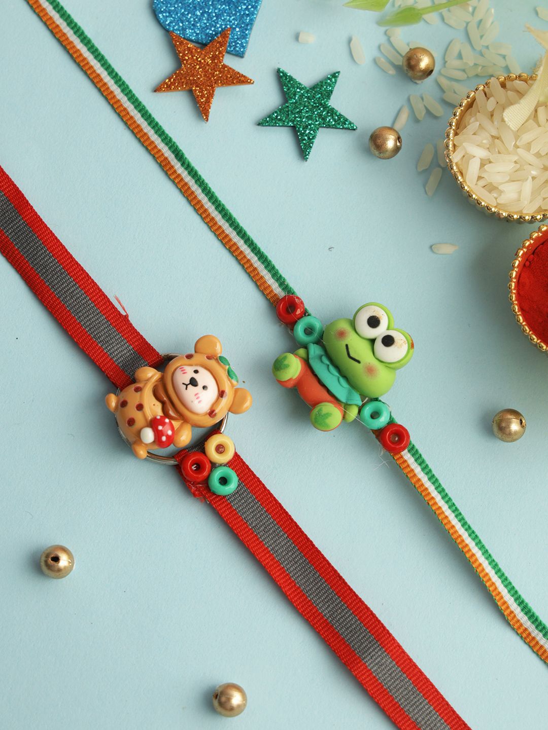 Kook N Keech Red Set Of 2 Teddy & Frog Thread Rakhis With Roli Chawal & Greeting Card
Kook N Keech Red Set Of 2 Teddy & Frog Thread Rakhis With Roli Chawal & Greeting Card