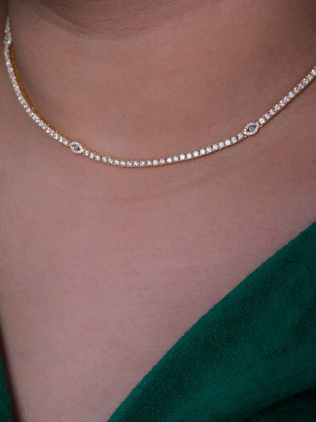 Anushka Jain Jewellery 925 Sterling Silver Gold-Plated Evil Eye Tennis Choker Necklace
Anushka Jain Jewellery 925 Sterling Silver Gold-Plated Evil Eye Tennis Choker Necklace
