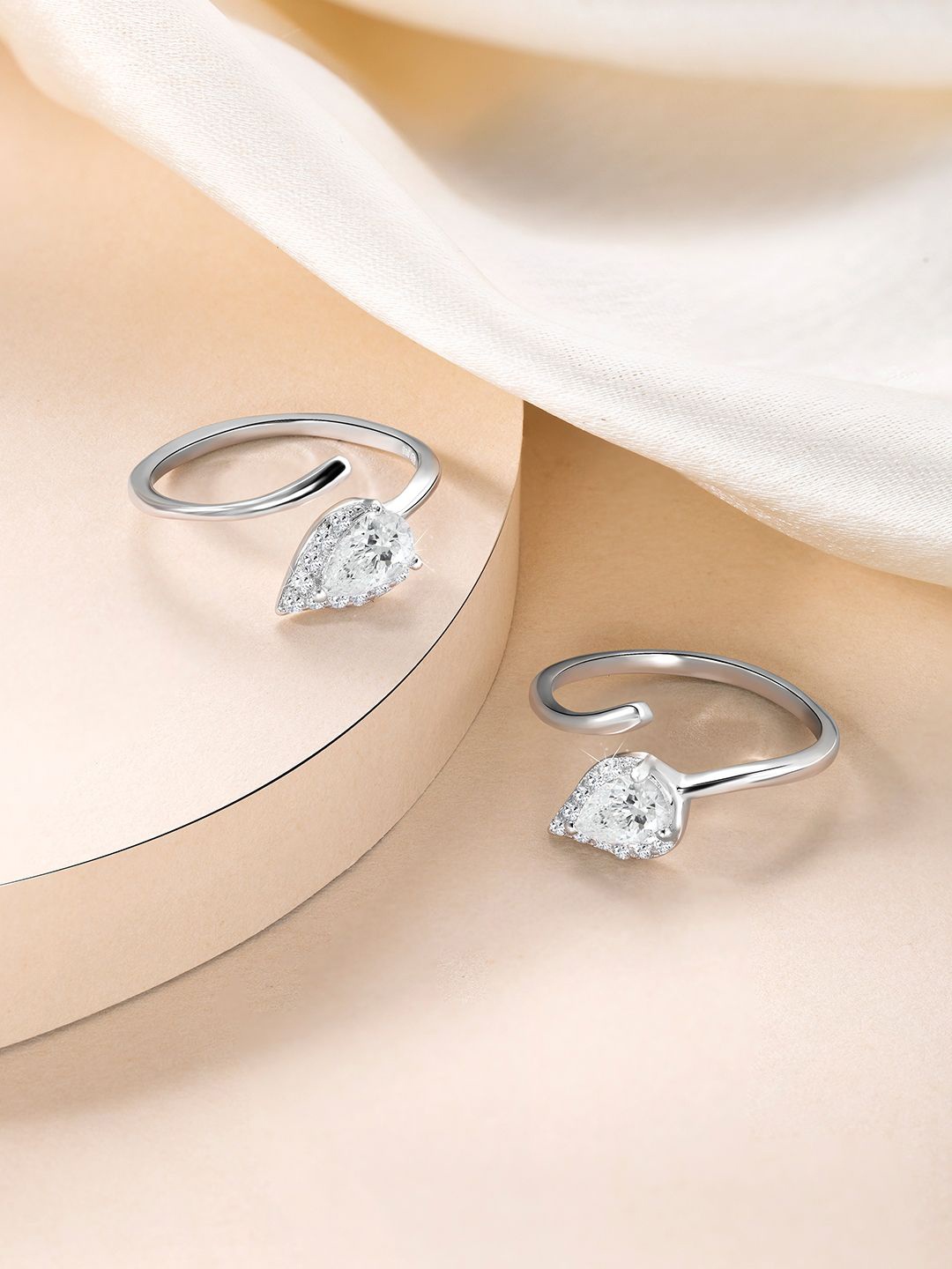 Silvora by Peora 925 Sterling Silver Plated Cubic Zirconia Studded Adjustable Toe Rings
Silvora by Peora 925 Sterling Silver Plated Cubic Zirconia Studded Adjustable Toe Rings