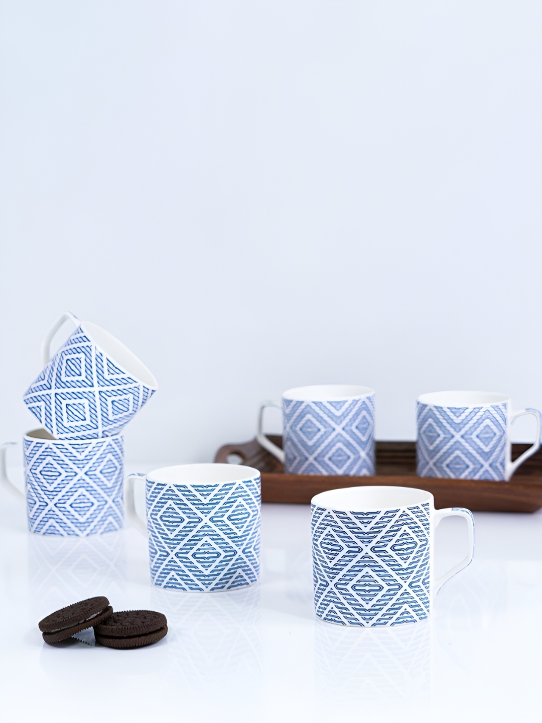 UPC White & Blue 6 Pieces Printed Ceramic Easy to Clean Glossy Finished Cups 220 ml Each
UPC White & Blue 6 Pieces Printed Ceramic Easy to Clean Glossy Finished Cups 220 ml Each