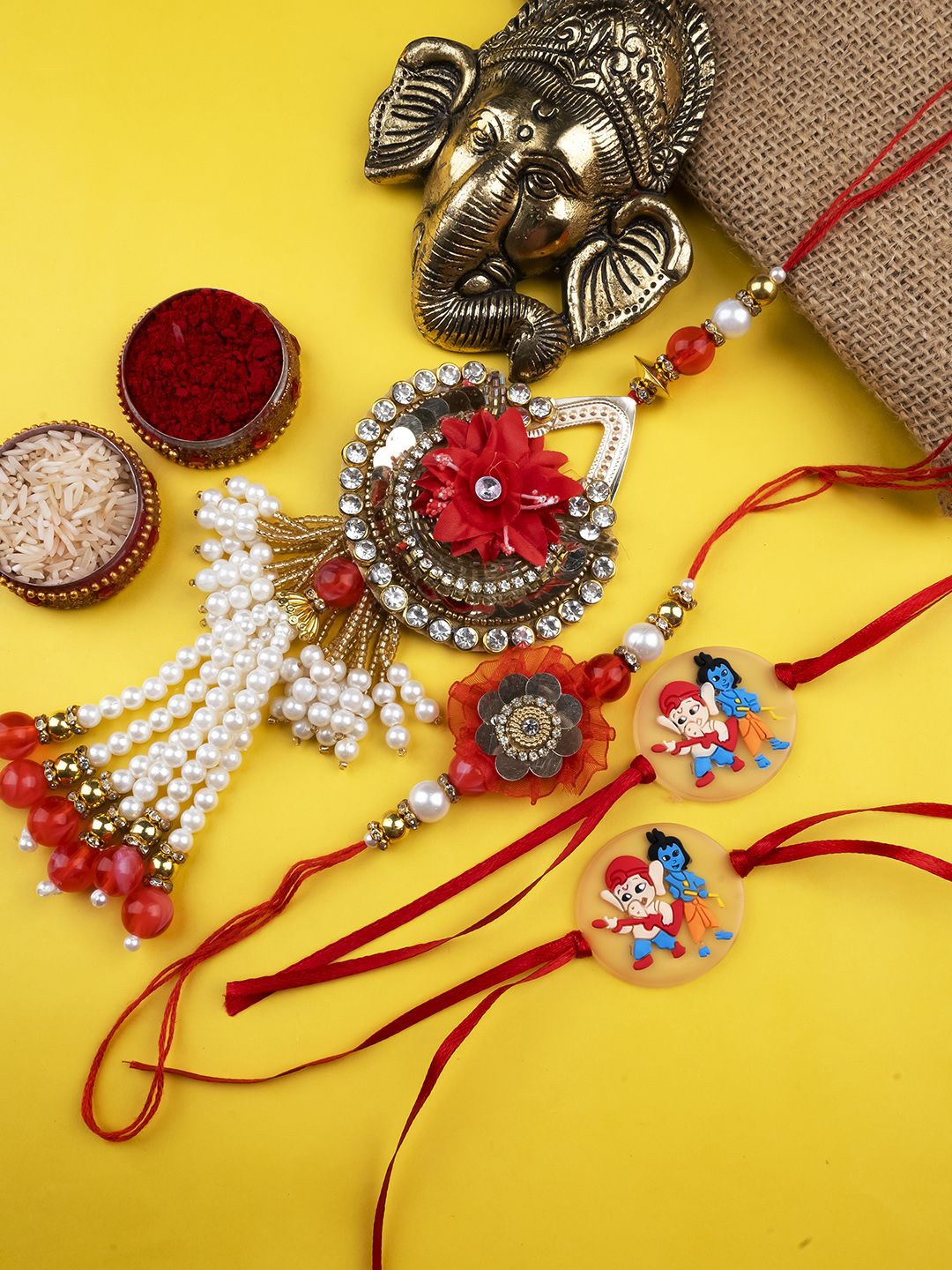 StileAdda Set Of 3 Bhaiya Bhabhi & Ganesha Krishna Charm Rakhis With Roli Chawal, Red
StileAdda Set Of 3 Bhaiya Bhabhi & Ganesha Krishna Charm Rakhis With Roli Chawal, Red