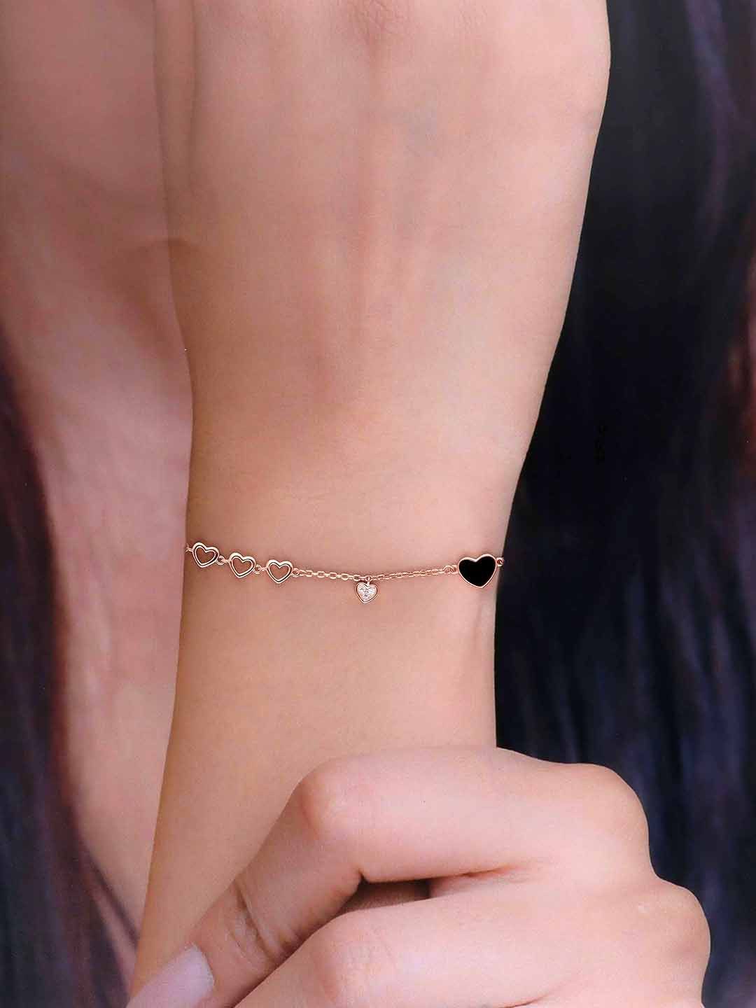 KAI JEWEL Rose Gold Plated 92.5 Sterling Silver Cubic Zirconia Charm Bracelet
KAI JEWEL Rose Gold Plated 92.5 Sterling Silver Cubic Zirconia Charm Bracelet
