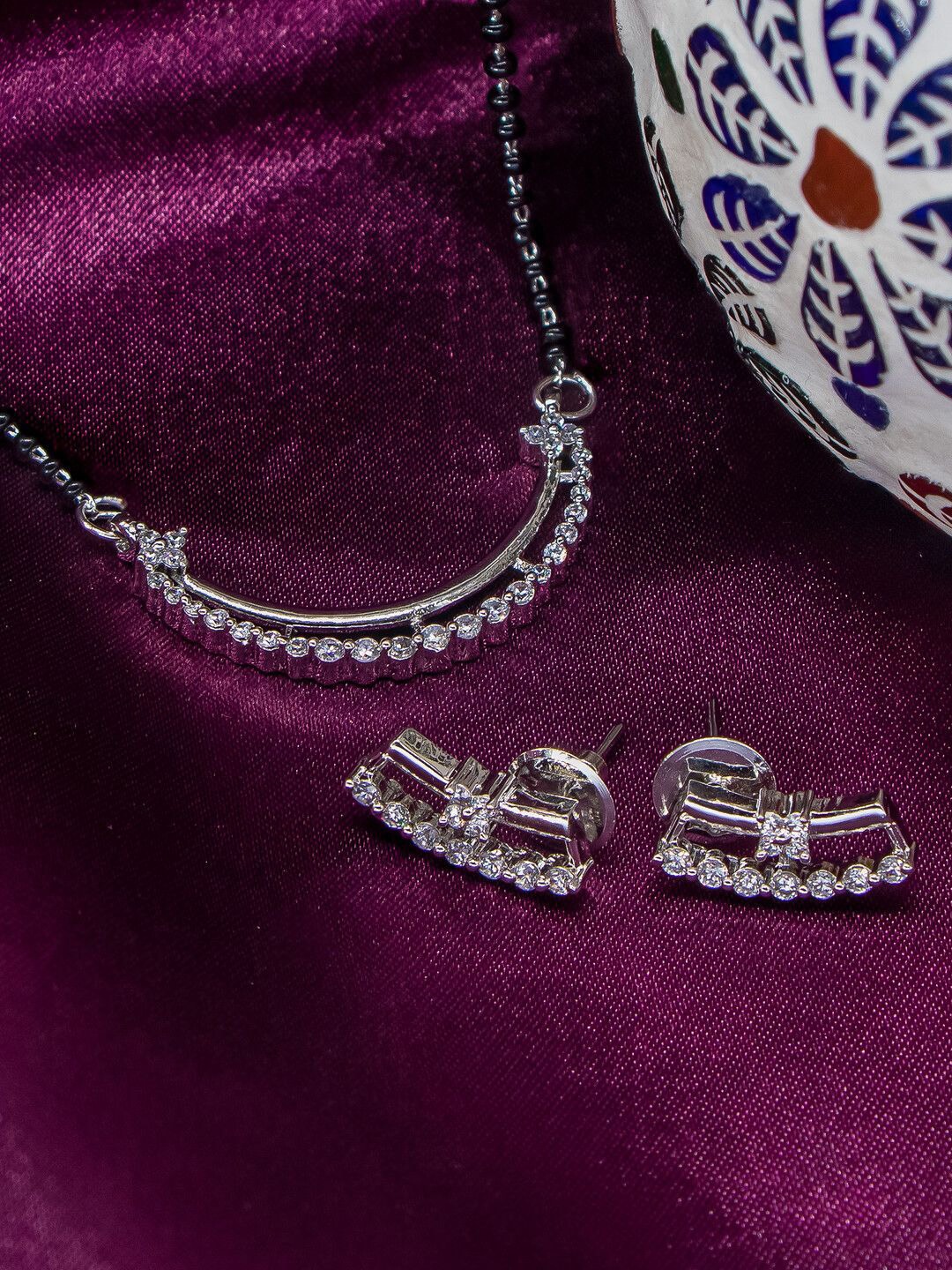 Manikya Rhodium Plated American Diamond Stone Studded & Beaded Mangalsutra, Silver
Manikya Rhodium Plated American Diamond Stone Studded & Beaded Mangalsutra, Silver