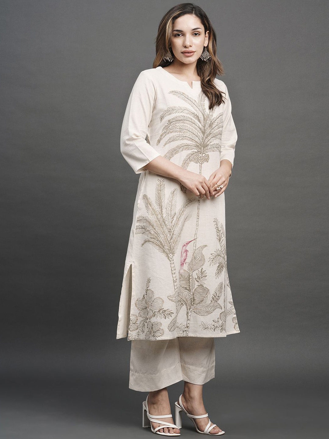KALINI Floral Printed Notch Neck Thread Work Pure Cotton Straight Kurta With Palazzos, Cream
KALINI Floral Printed Notch Neck Thread Work Pure Cotton Straight Kurta With Palazzos, Cream