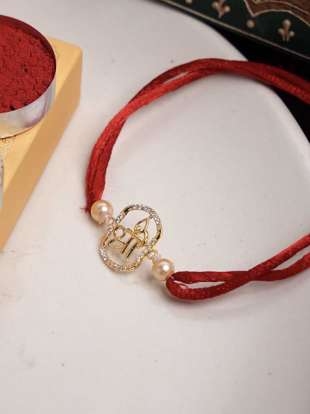 PANASH- 925 Sterling Gold -Plated Name Of Shree CZ Stone Studded Rakhi With Roli Chawal
PANASH- 925 Sterling Gold -Plated Name Of Shree CZ Stone Studded Rakhi With Roli Chawal