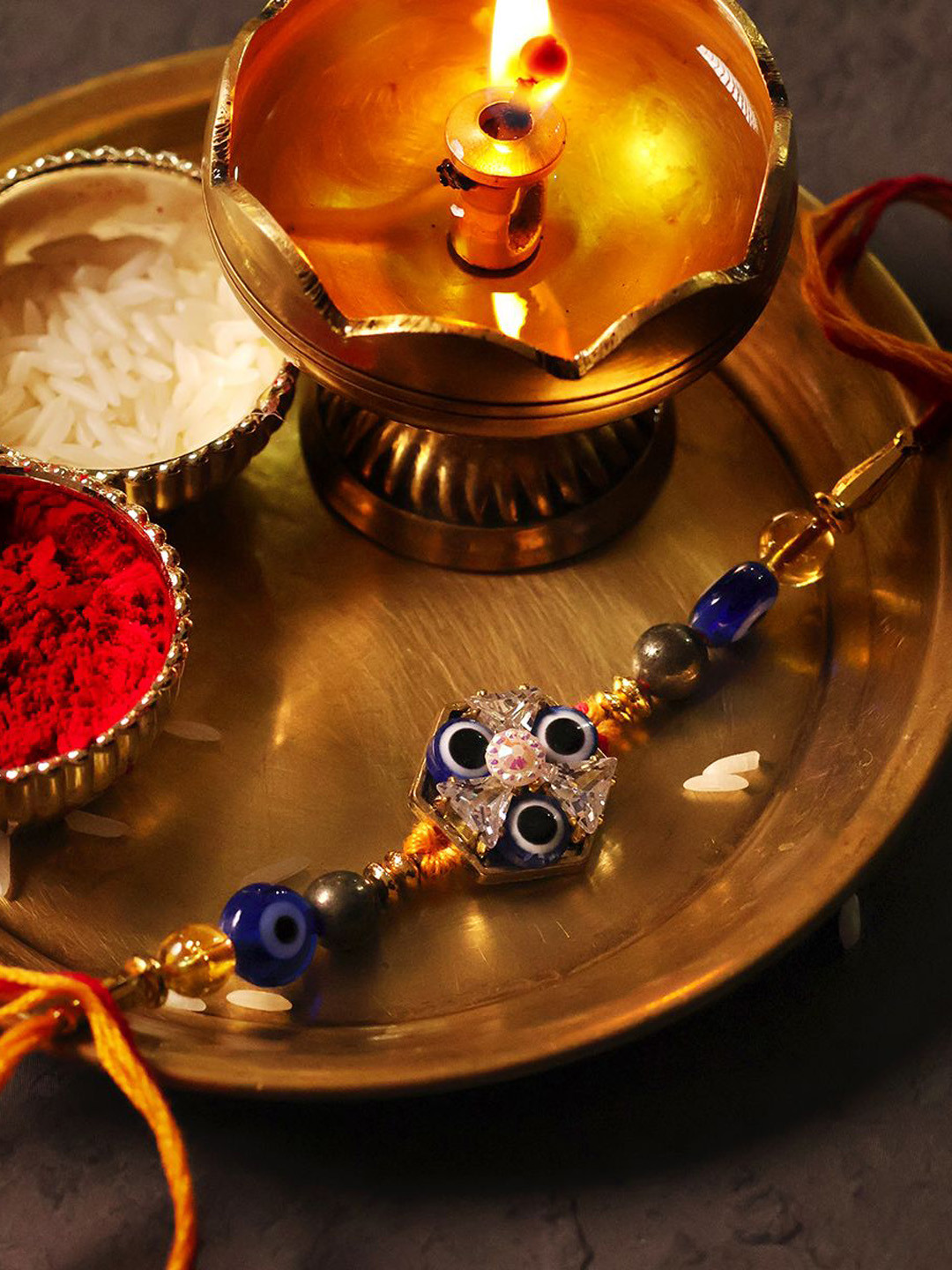 Shubhanjali Set Of 2 Evil Eye Hexagon Thread Rakhis With Roli Chawal & Greeting Card, Blue
Shubhanjali Set Of 2 Evil Eye Hexagon Thread Rakhis With Roli Chawal & Greeting Card, Blue