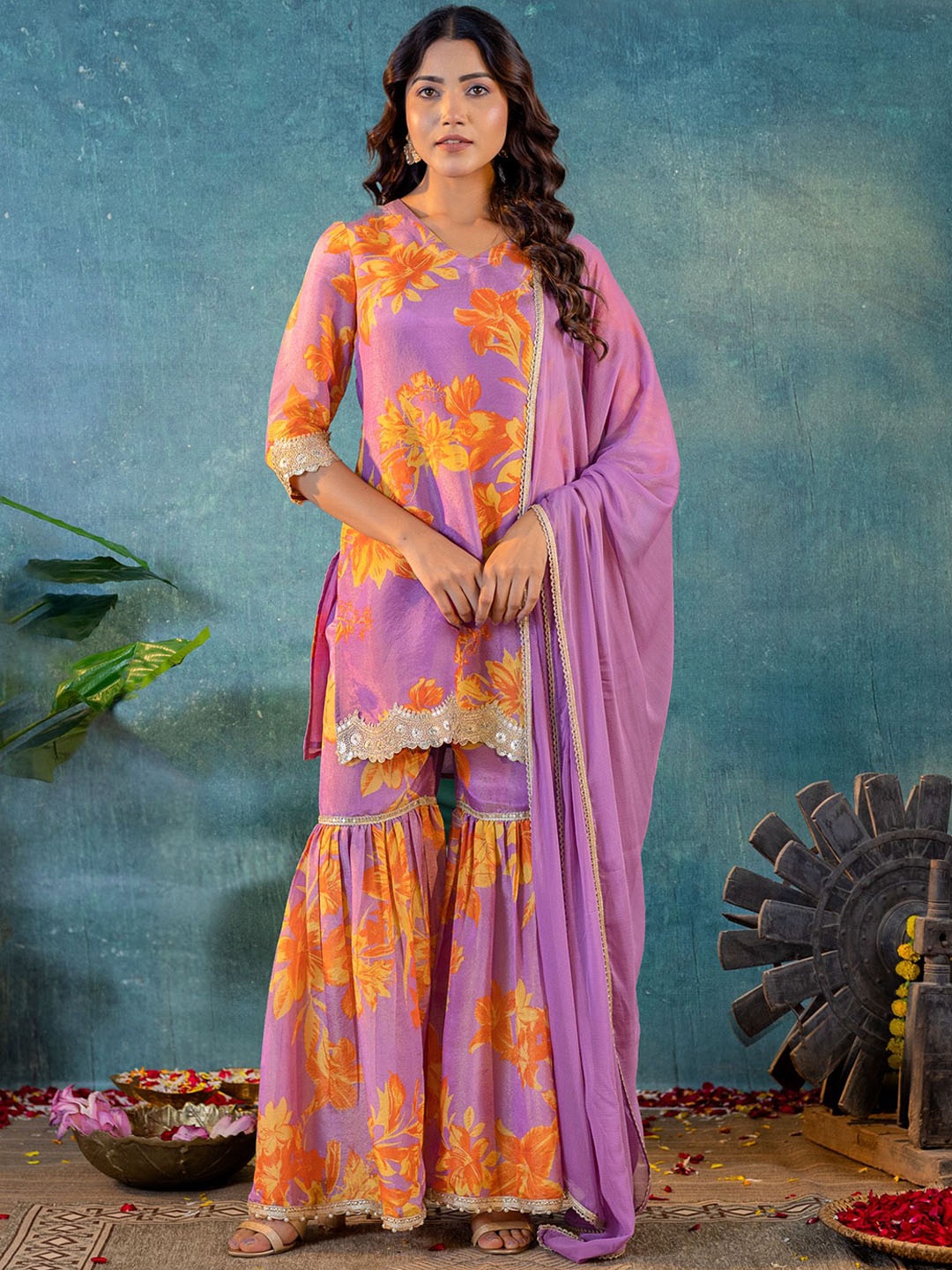KASYA Floral Printed Beads and Stones V-Neck Tissue Kurta with Sharara & With Dupatta, Purple
KASYA Floral Printed Beads and Stones V-Neck Tissue Kurta with Sharara & With Dupatta, Purple