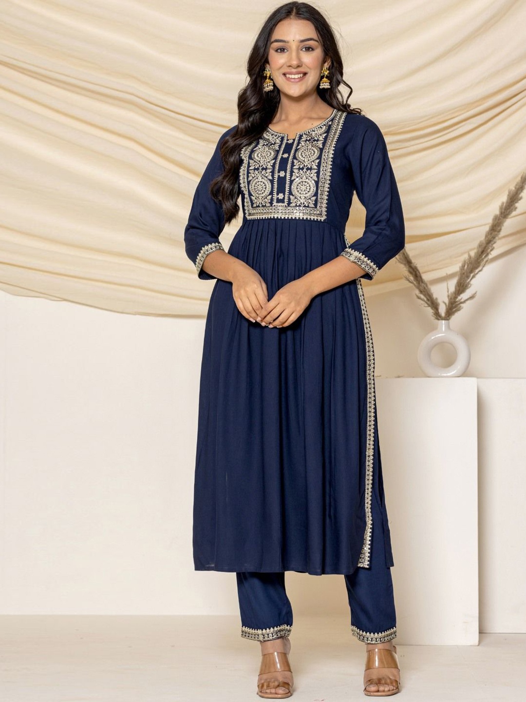 VEDANA Floral Embroidered Round Neck High Slit Sequinned Kurta With Trouser, Navy blue
VEDANA Floral Embroidered Round Neck High Slit Sequinned Kurta With Trouser, Navy blue