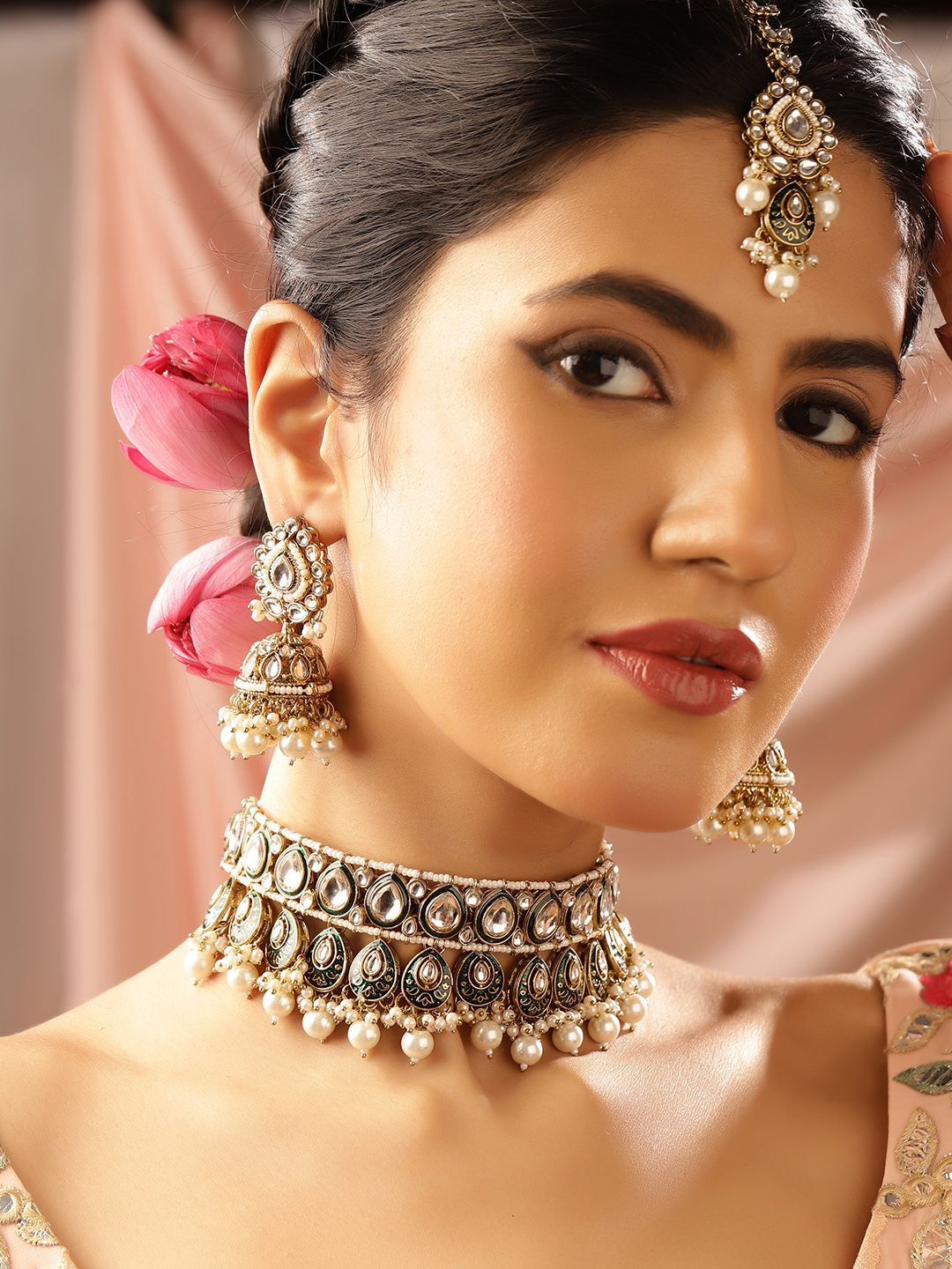 Priyaasi Gold-Plated Kundan Stone Studded & Pearls Beaded Elegance Choker Jewellery Set
Priyaasi Gold-Plated Kundan Stone Studded & Pearls Beaded Elegance Choker Jewellery Set