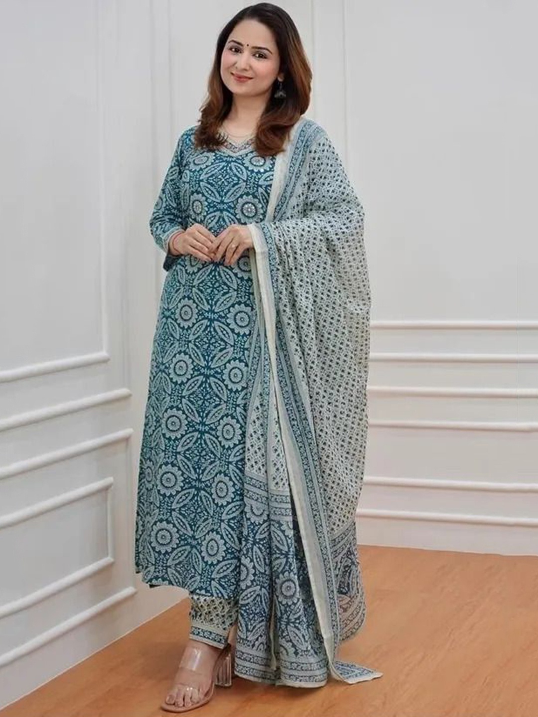 Misti Exim V-Neck Floral Printed Mirror Work Straight Kurta with Trouser & Dupatta, Blue
Misti Exim V-Neck Floral Printed Mirror Work Straight Kurta with Trouser & Dupatta, Blue