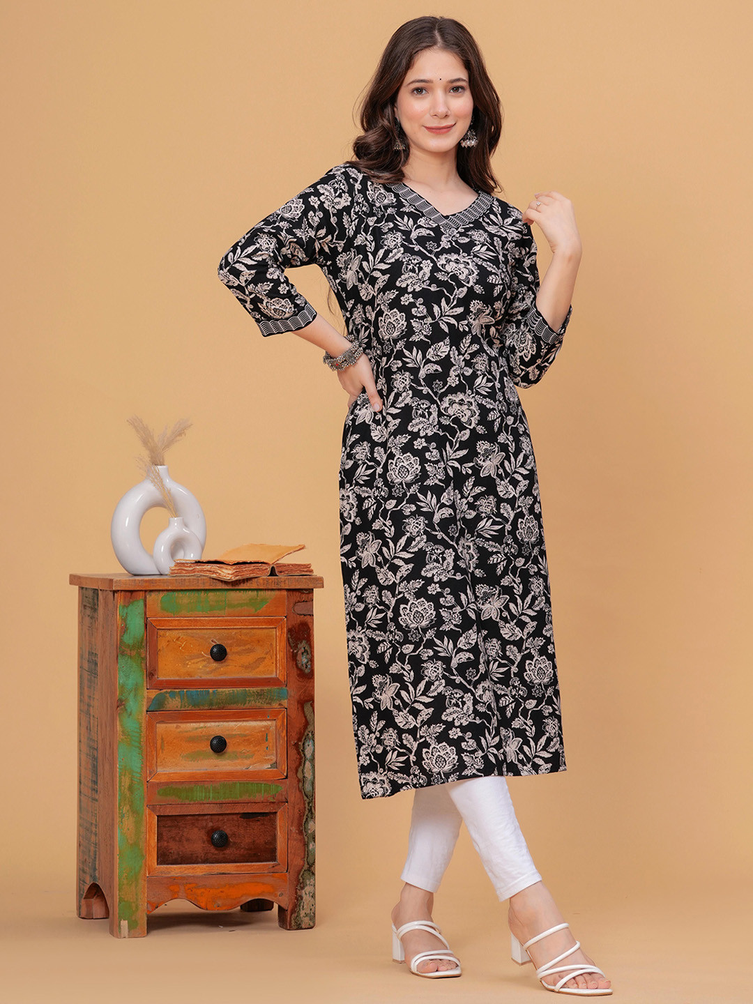 KALINI Floral Printed Three-Quarter Sleeves Straight Kurta, Black
KALINI Floral Printed Three-Quarter Sleeves Straight Kurta, Black