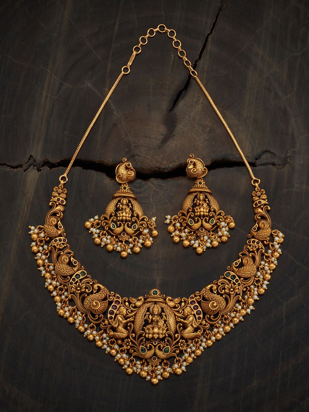 Kushal's Fashion Jewellery Gold-Plated Kundan Stone Studded Temple Antique Jewellery Set
Kushal's Fashion Jewellery Gold-Plated Kundan Stone Studded Temple Antique Jewellery Set