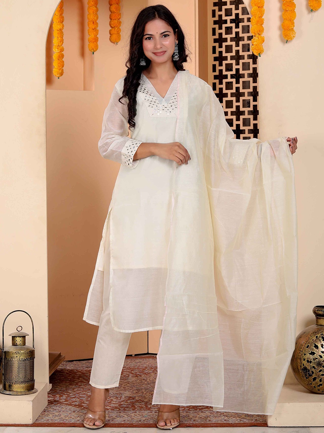 MIRAVAN Women Embroidered Regular Mirror Work Chanderi Cotton Kurta with Palazzos & With Dupatta, Cream
MIRAVAN Women Embroidered Regular Mirror Work Chanderi Cotton Kurta with Palazzos & With Dupatta, Cream