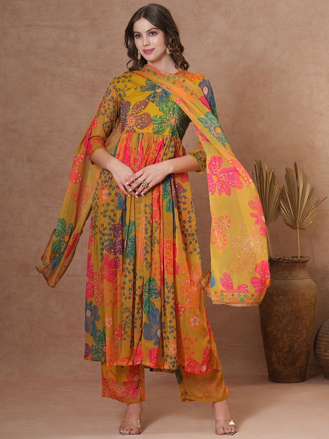 FASHOR Women Floral Printed A-Line Pleated Kurta with Trousers & With Dupatta, Yellow
FASHOR Women Floral Printed A-Line Pleated Kurta with Trousers & With Dupatta, Yellow