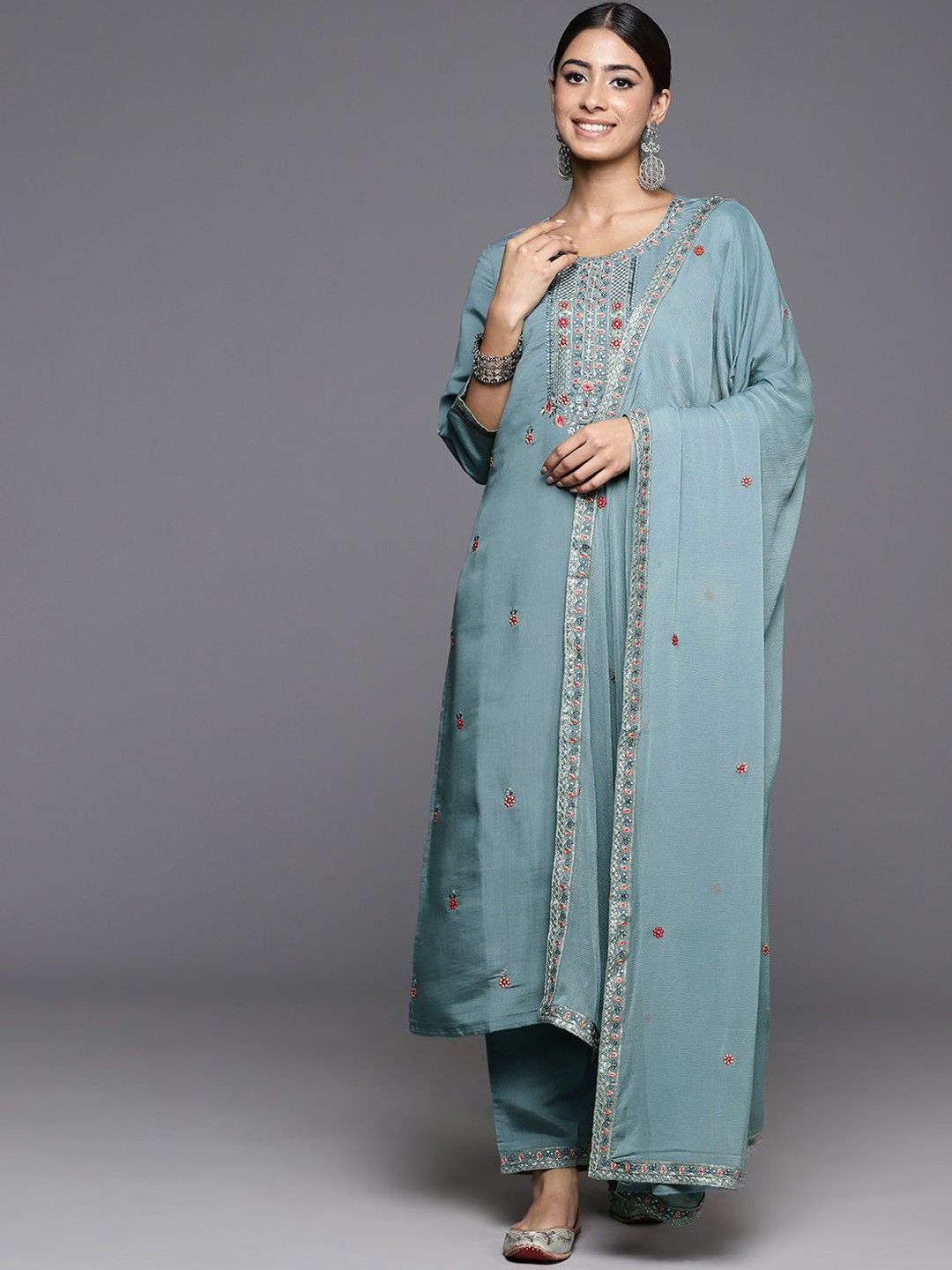 KALINI Women Floral Embroidered Regular Sequinned Kurta with Trousers & With Dupatta, Blue
KALINI Women Floral Embroidered Regular Sequinned Kurta with Trousers & With Dupatta, Blue