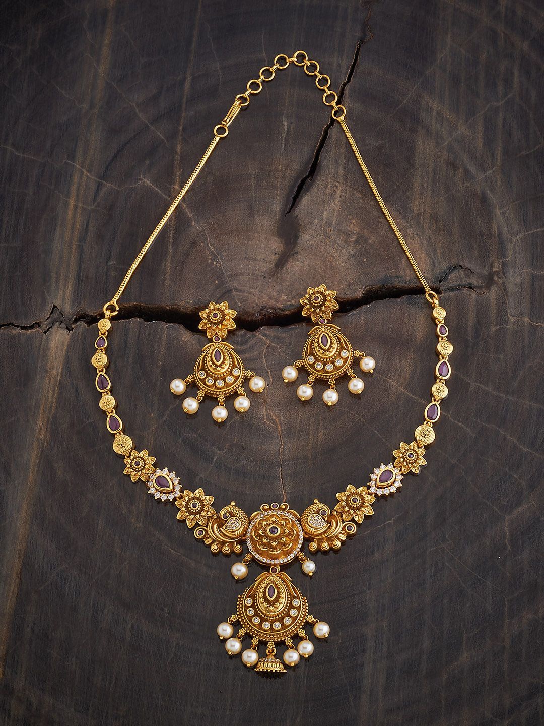 Kushal's Fashion Jewellery Gold-Plated Zircon-Studded & Beaded Antique Necklace & Earrings
Kushal's Fashion Jewellery Gold-Plated Zircon-Studded & Beaded Antique Necklace & Earrings